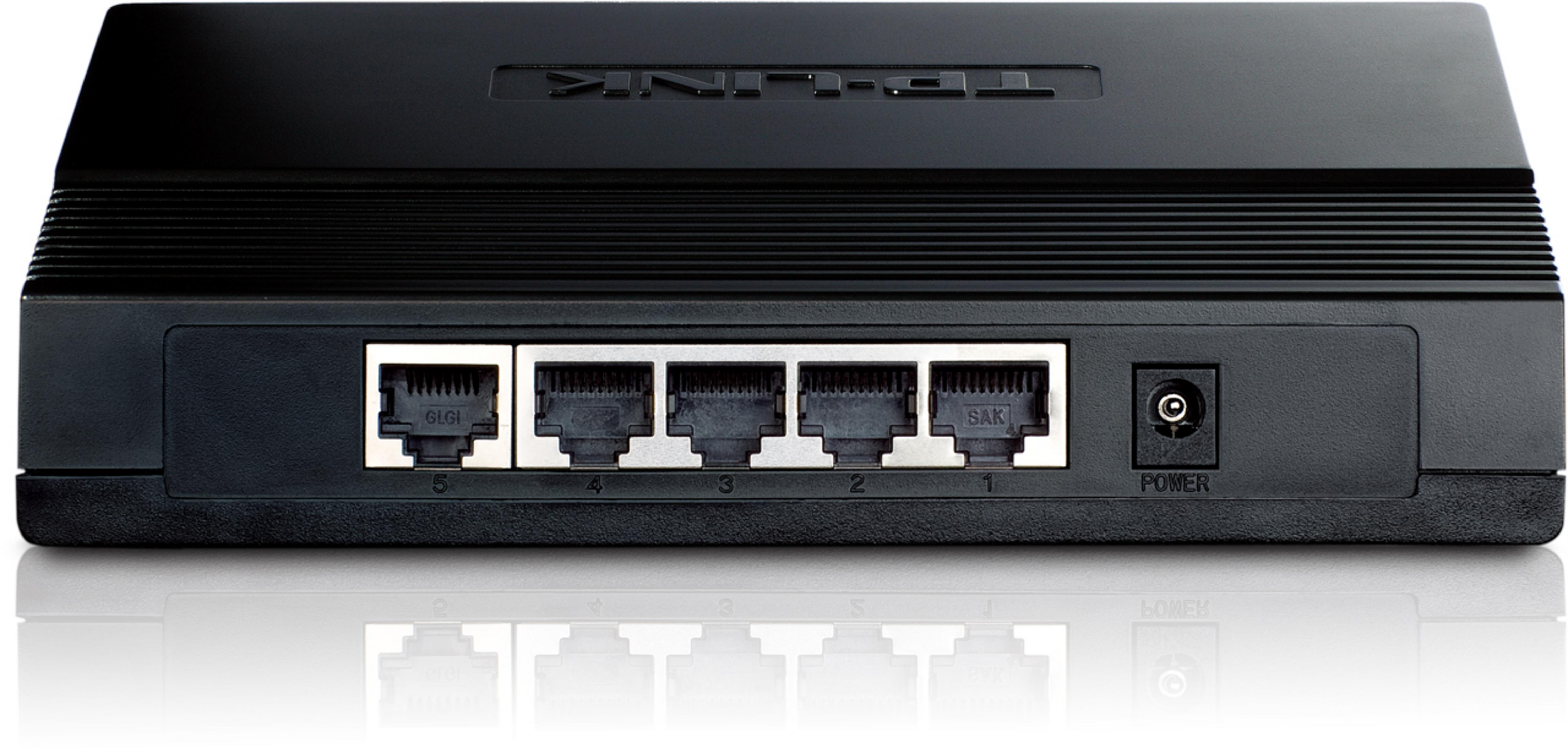 Switch di rete TP-Link nero con cinque porte Ethernet e ingresso di alimentazione.