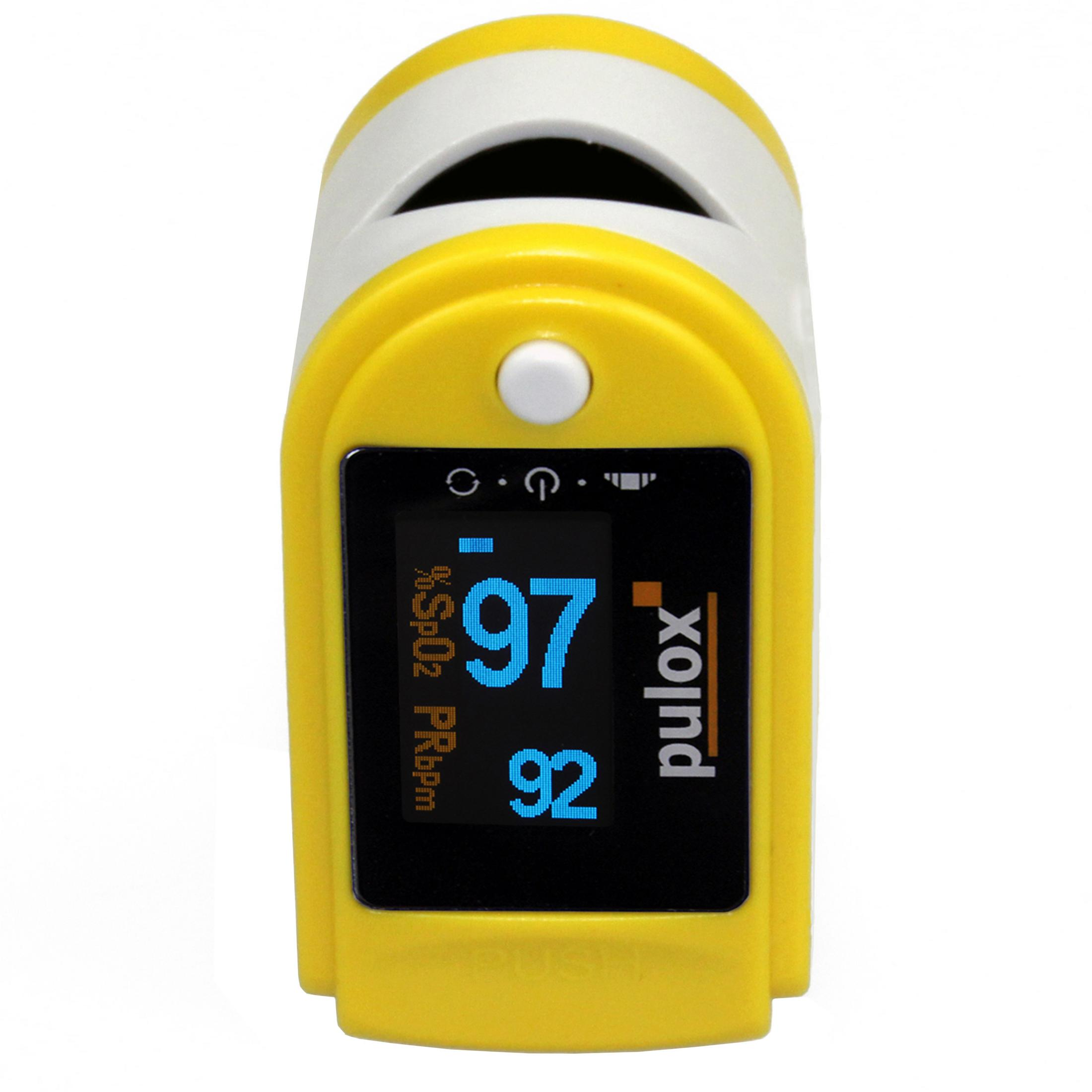 Ein gelbes Pulox Pulsoximeter zeigt 97% SpO2 und 92 bpm an.