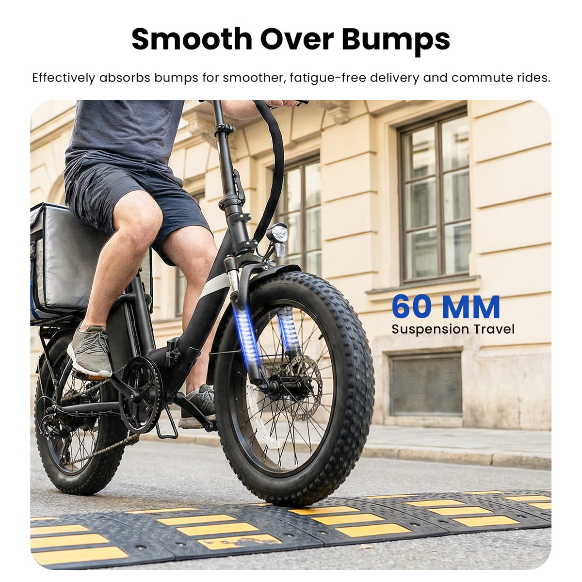 Ein Mann fährt mit einem E-Bike über einen Bremsschwellen, 60MM Federweg.