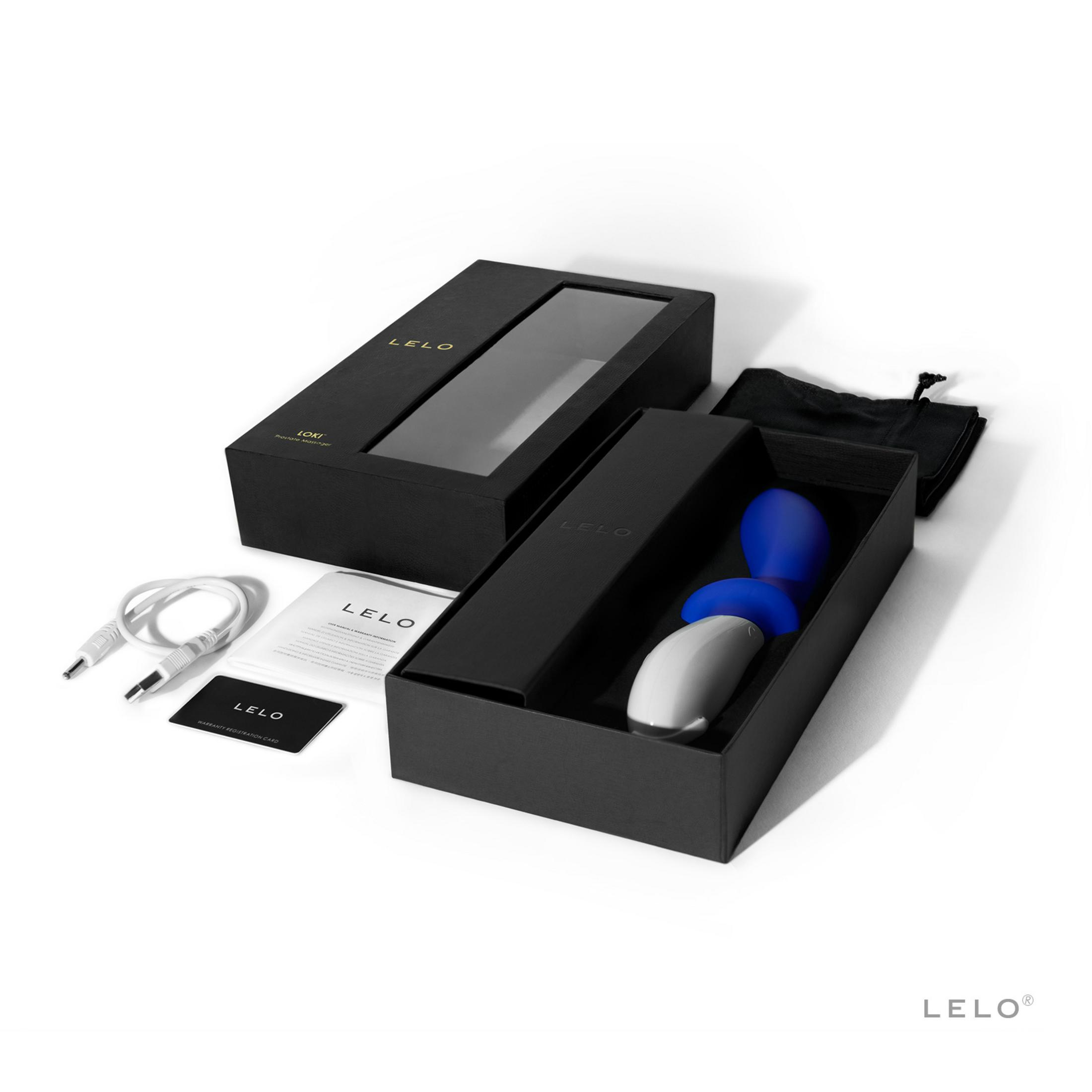 Un paquete negro LELO con un dispositivo, cables, manual y bolsa.