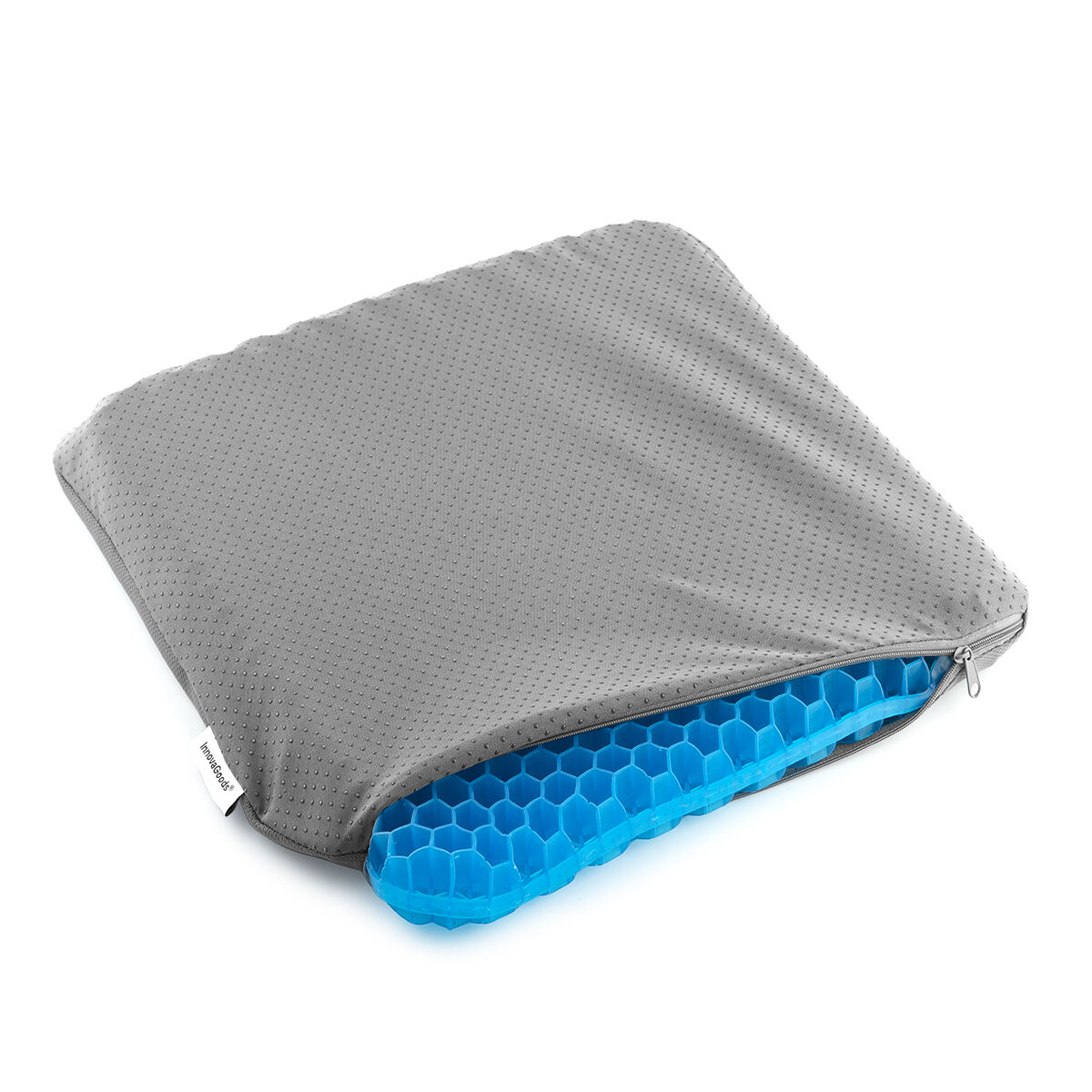 Cuscino grigio con inserto in gel blu a nido d'ape esposto.