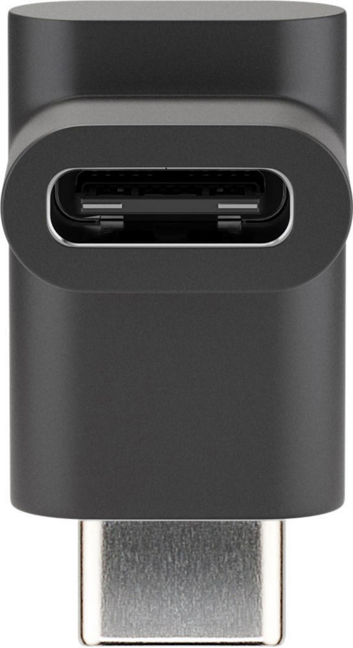 Ein schwarzer USB-C-Adapter mit einem silbernen USB-C-Stecker und einer USB-C-Buchse.