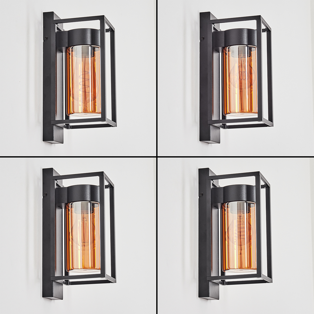 Moderne Wandleuchte mit schwarzem Metallrahmen und bernsteinfarbenem Glaszylinder.