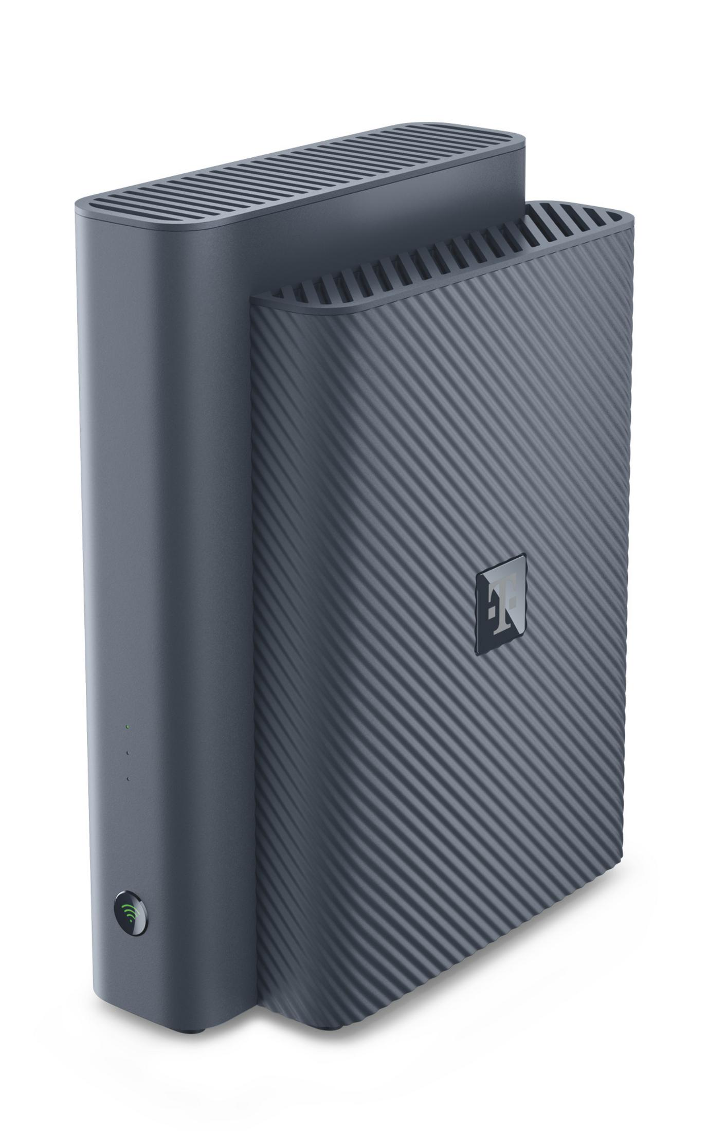 Ein grauer Router mit Lüftungsschlitzen und einem Logo.