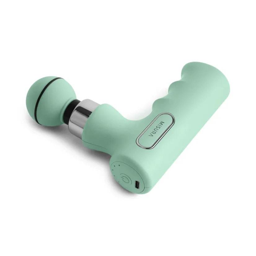 Pistola de masaje verde menta con cabezal redondo y mango ergonómico.