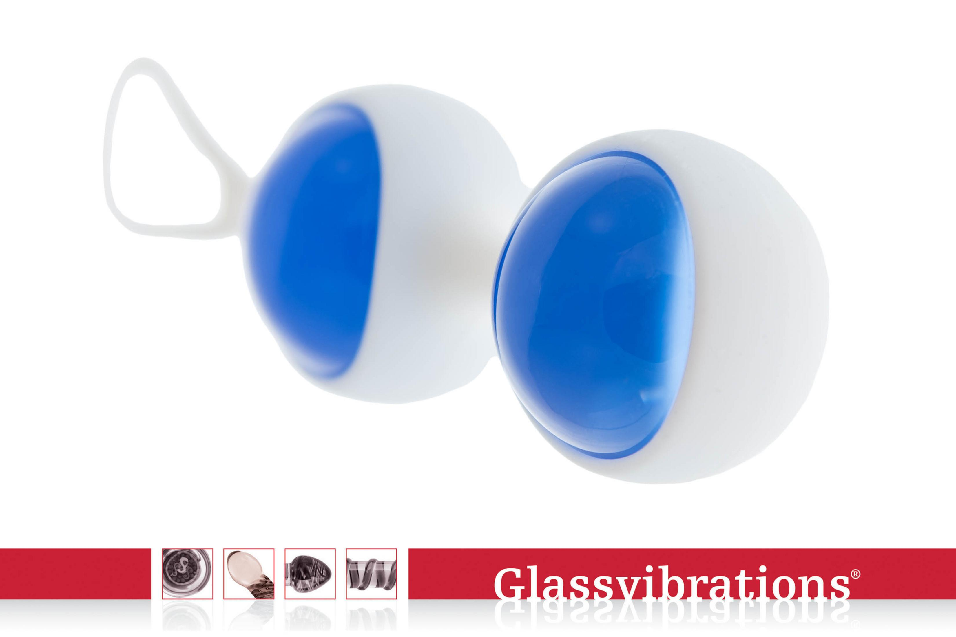 Zwei weiße Kugeln mit blauen Einsätzen und einer Schlaufe.