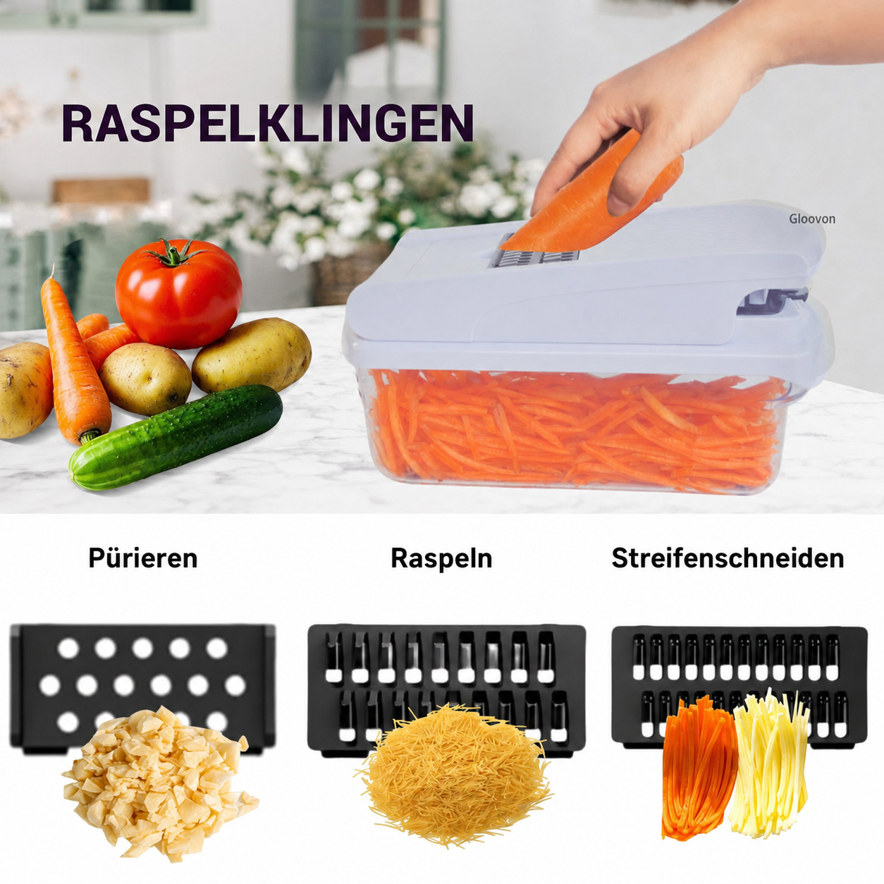 Gemüse, darunter Karotten, Kartoffeln und Gurke, neben einem Gemüseschneider mit geraspelten Karotten.