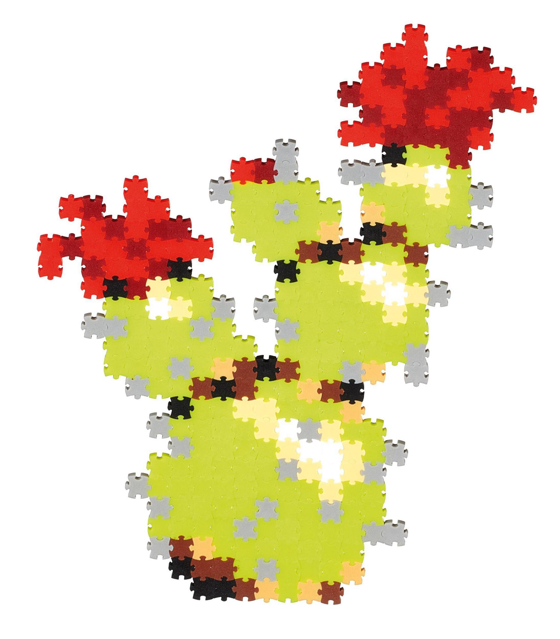 Ein Kaktus aus bunten Puzzleteilen mit roten Blüten.