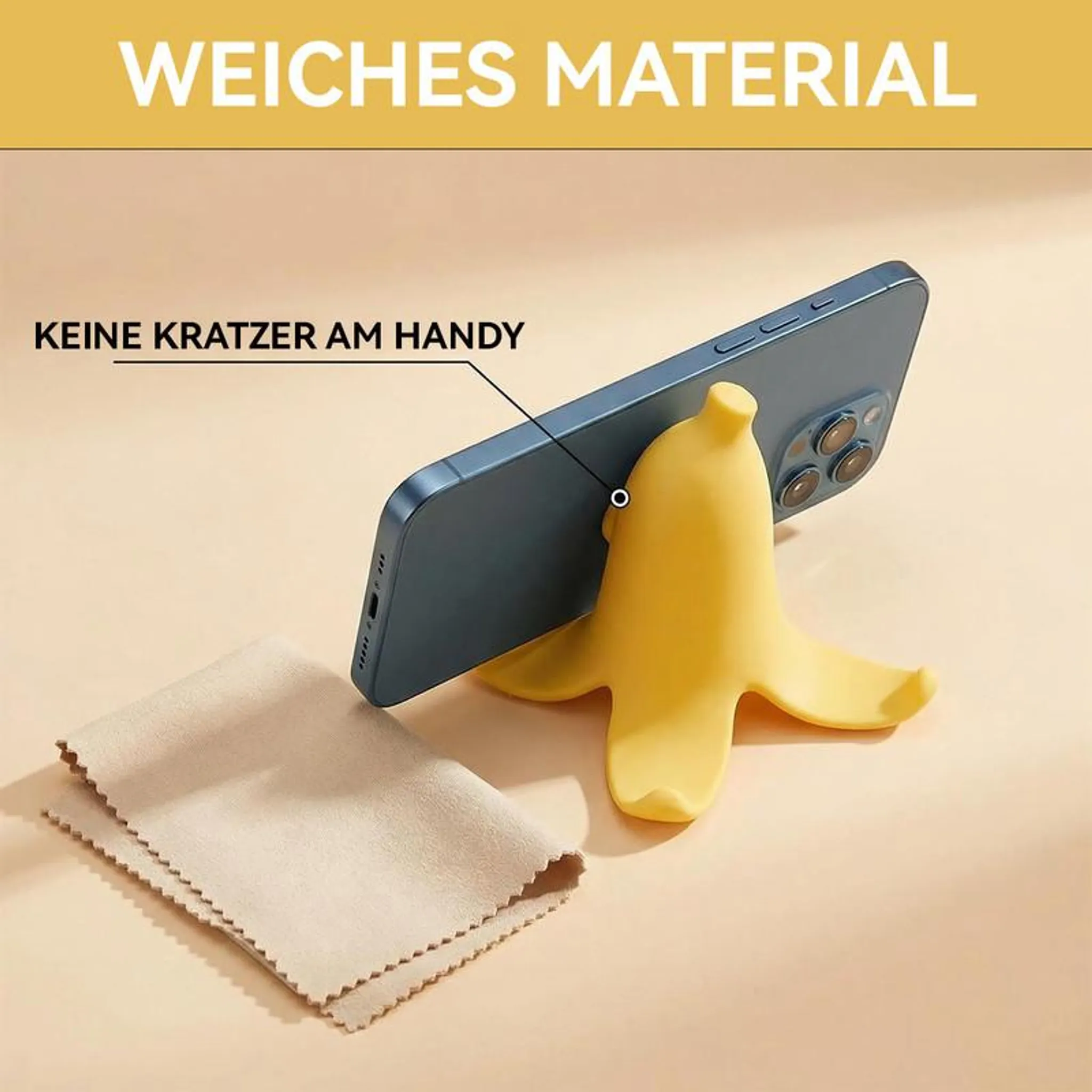 Ein gelber Bananen-Handyhalter stützt ein blaues Smartphone. Daneben liegt ein beige Tuch.