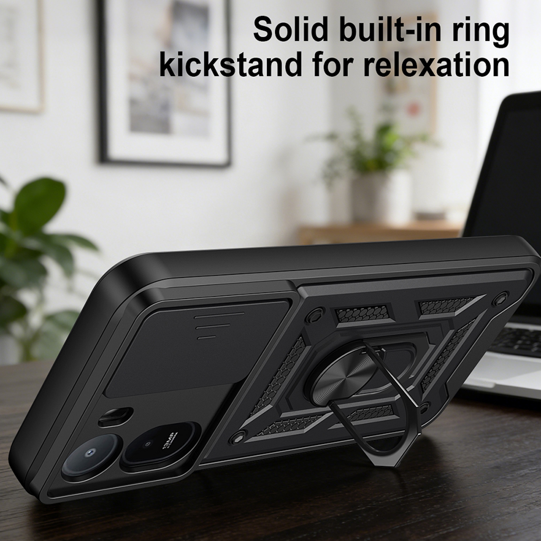 Schwarze Handyhülle mit eingebautem Ringständer auf einem Holztisch.