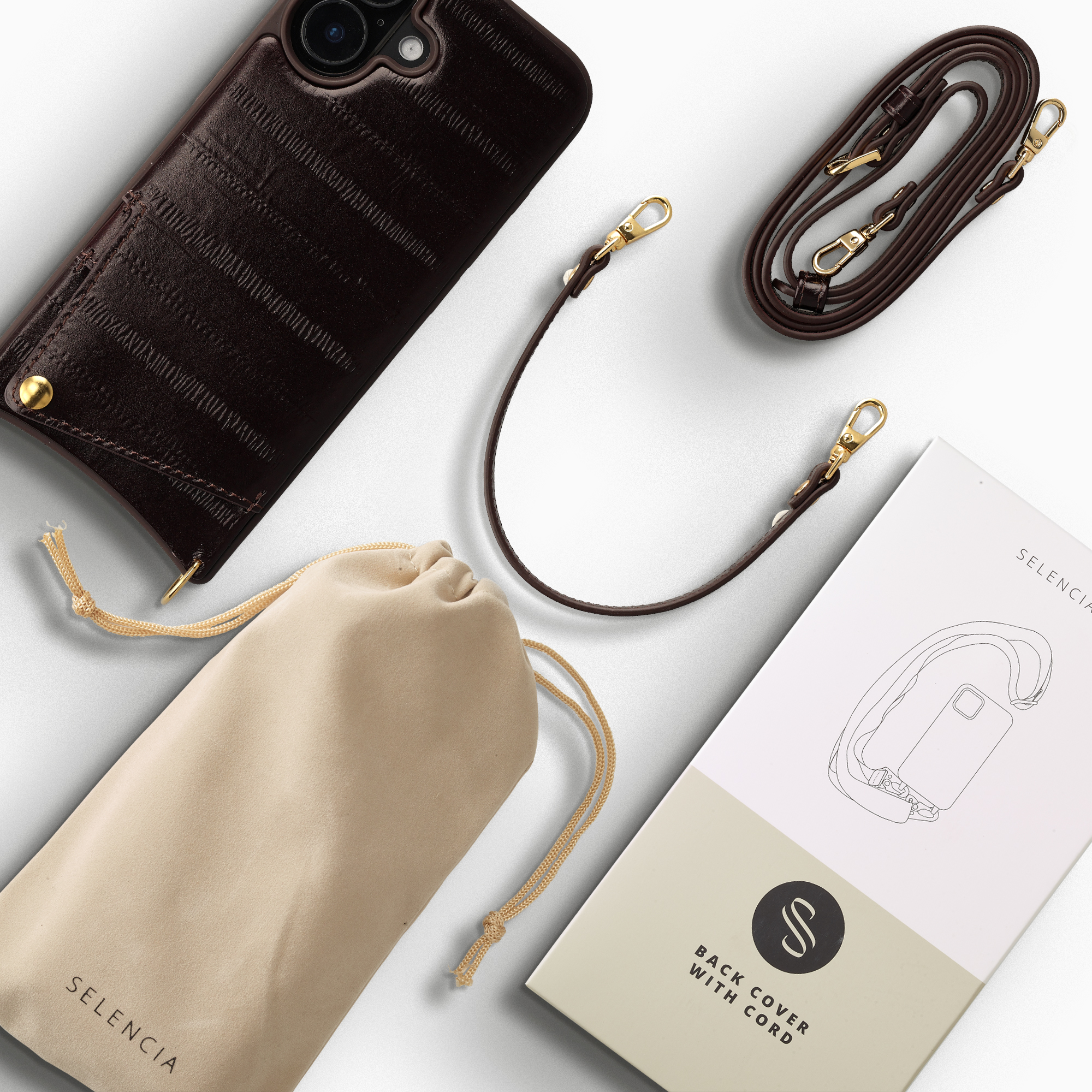 Dunkelbraune Ledertasche mit Kordel, Staubbeutel und Verpackung.