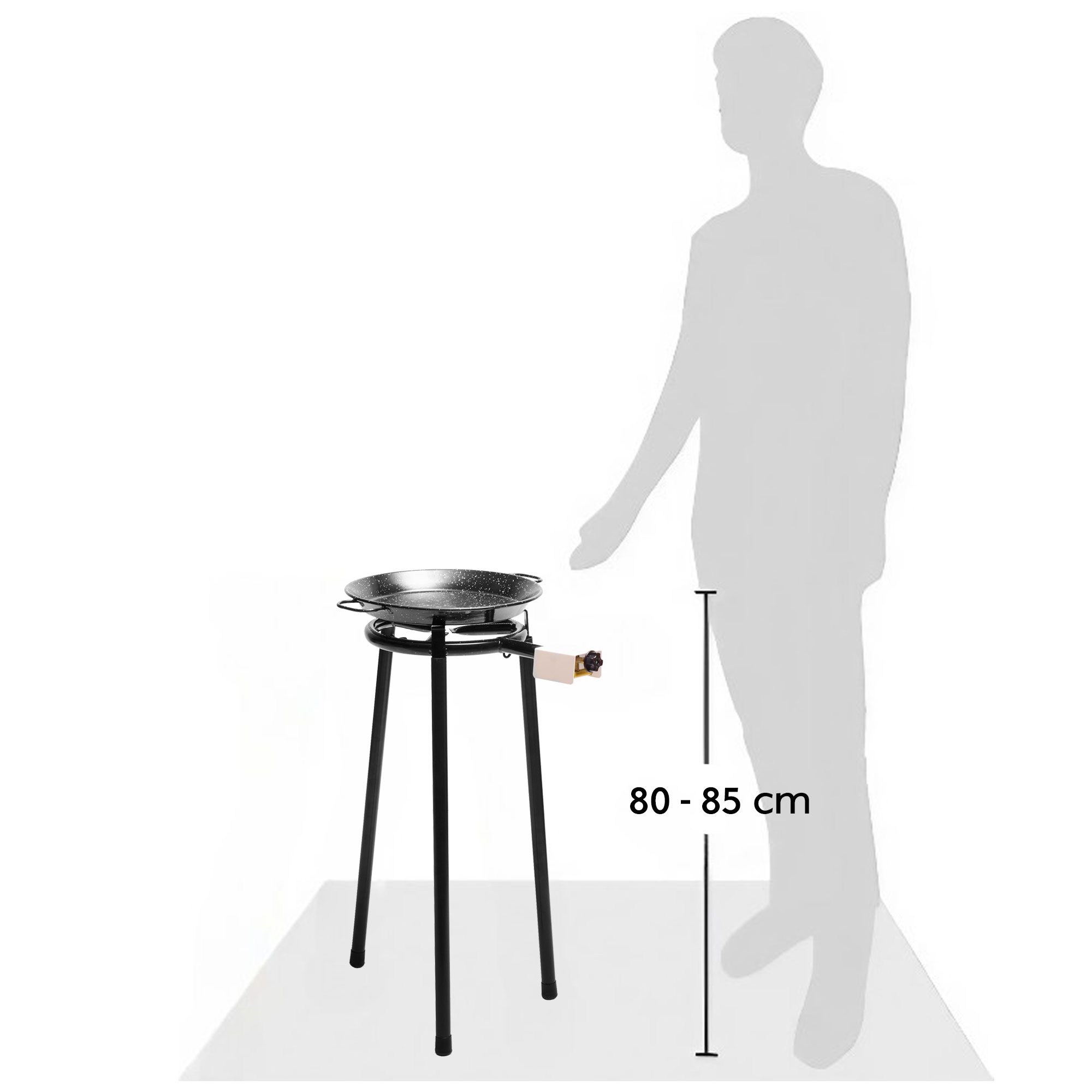 Una cocina negra de paella con tres patas y conexión de gas, junto a una silueta.