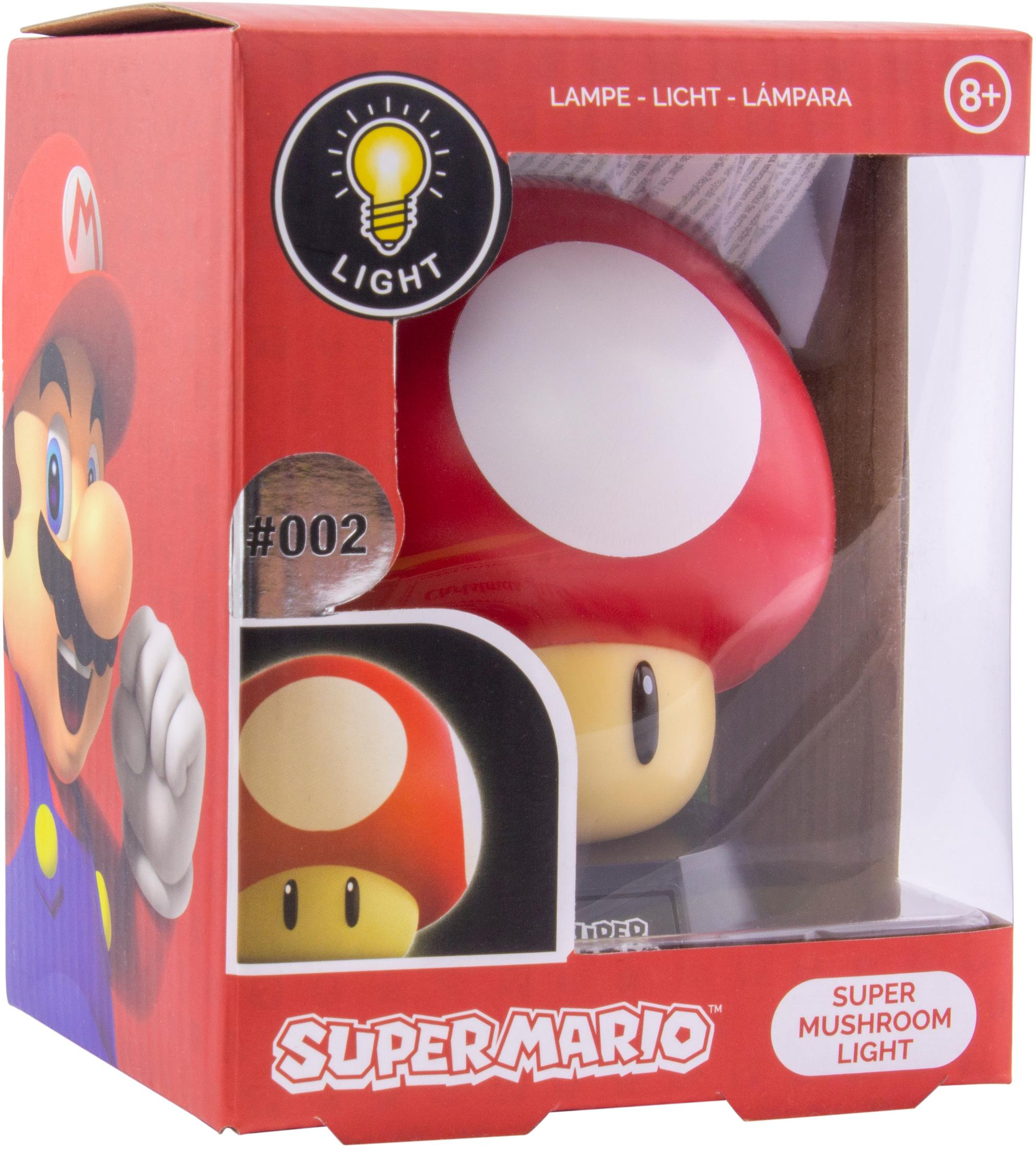 Pudełko Super Mario z czerwoną lampką grzyba i grafiką Mario. Wiek 8+.