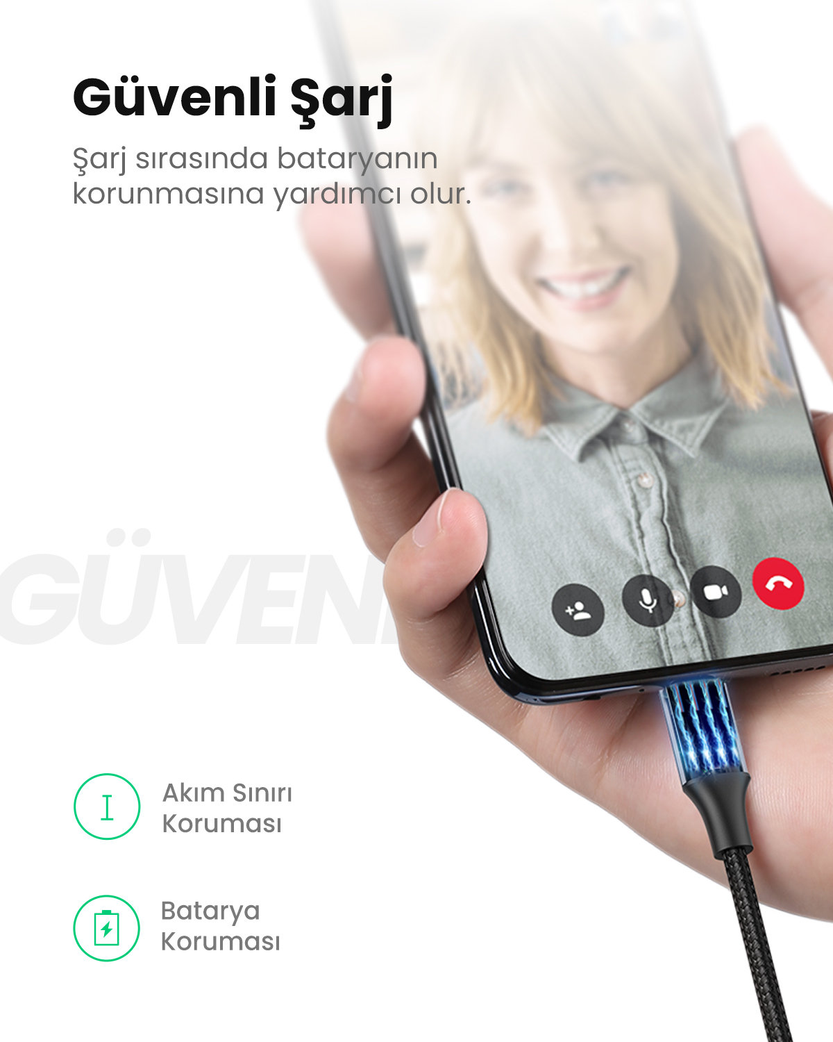 Telefon ładuje się świecącym kablem. Pokazuje kobietę na rozmowie wideo.