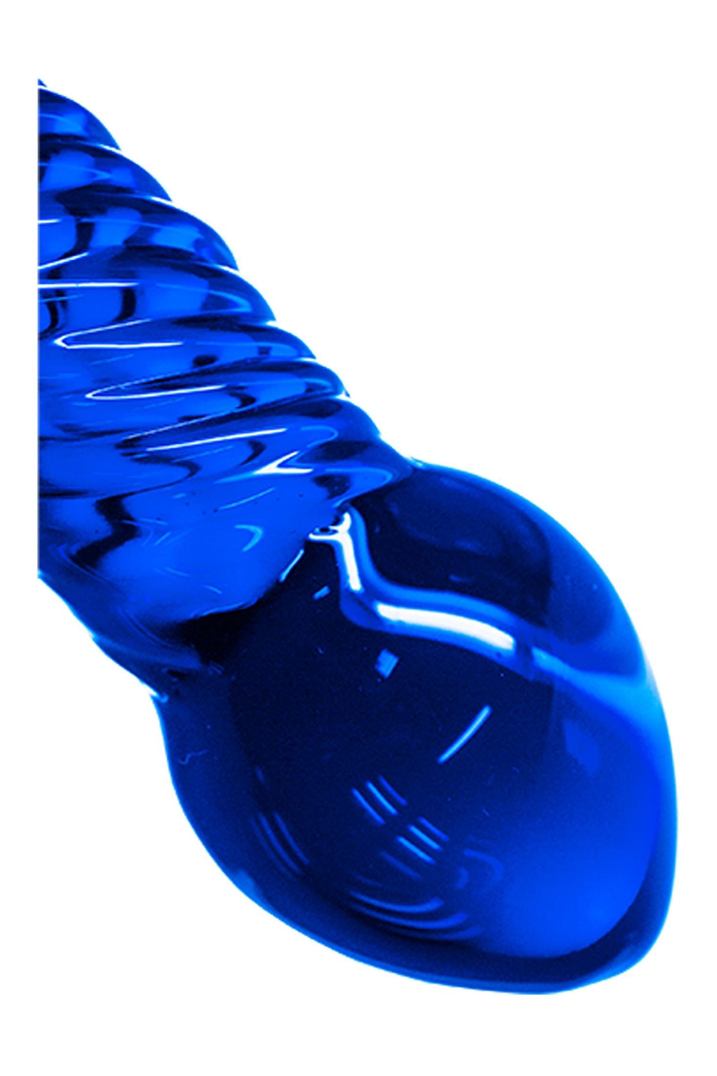 Glänzende blaue Farbe, die sich wie eine Spirale oder eine Schnecke windet.