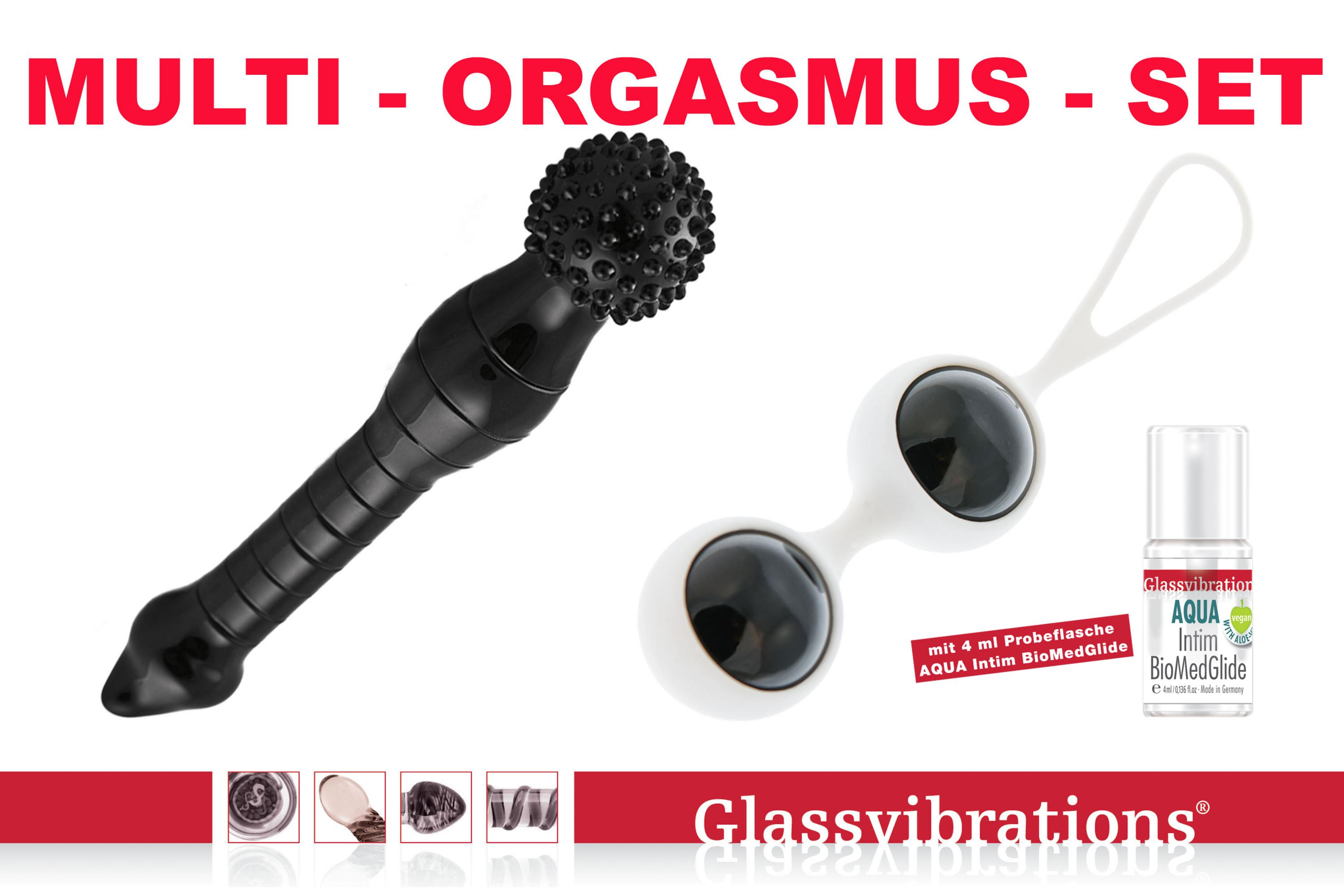 Ein schwarzer Vibrator, weiße Kugeln und eine Gleitmittelprobe.