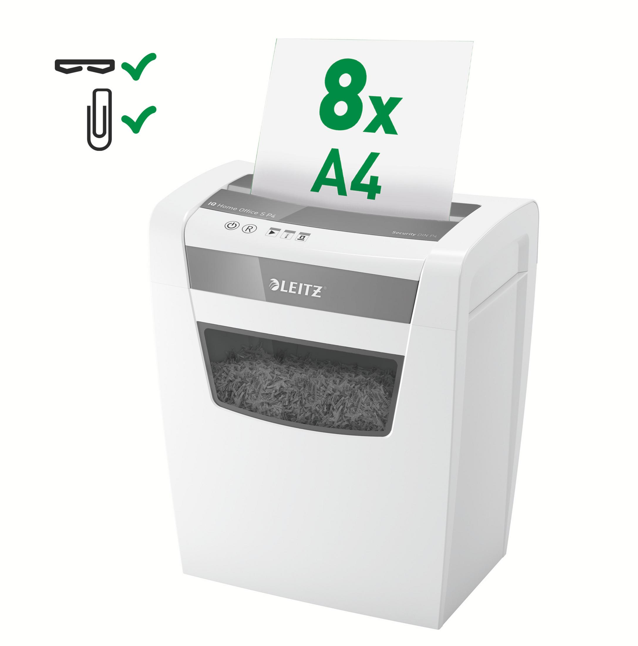 Une déchiqueteuse blanche avec du papier déchiqueté 8x A4.