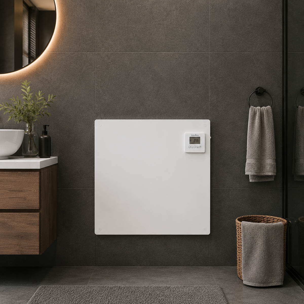 A white heater with a display hangs on a dark tiled wall above a sink.