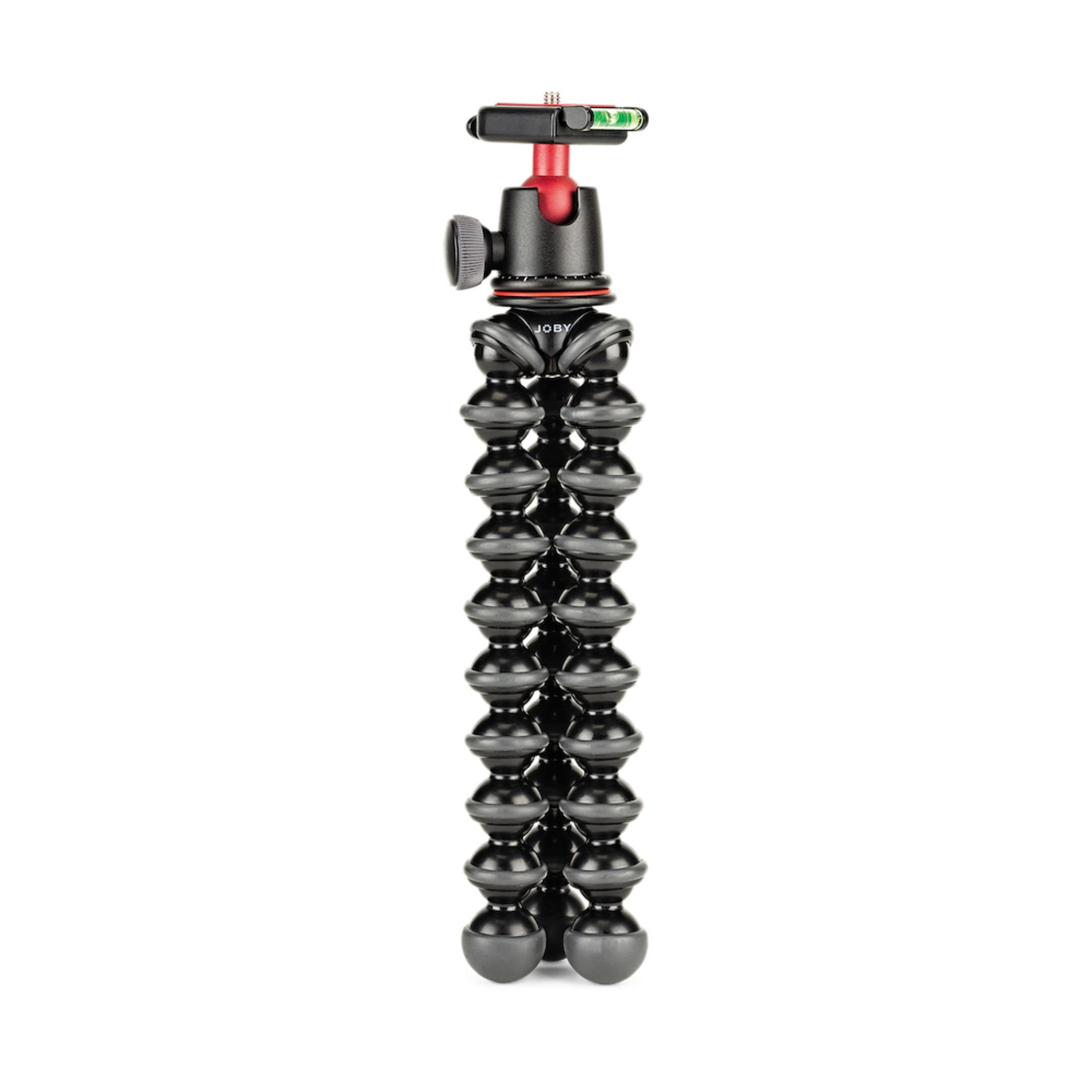 Ein schwarzer, flexibler GorillaPod-Stativ mit rotem und schwarzem Oberteil und einer Wasserwaage.