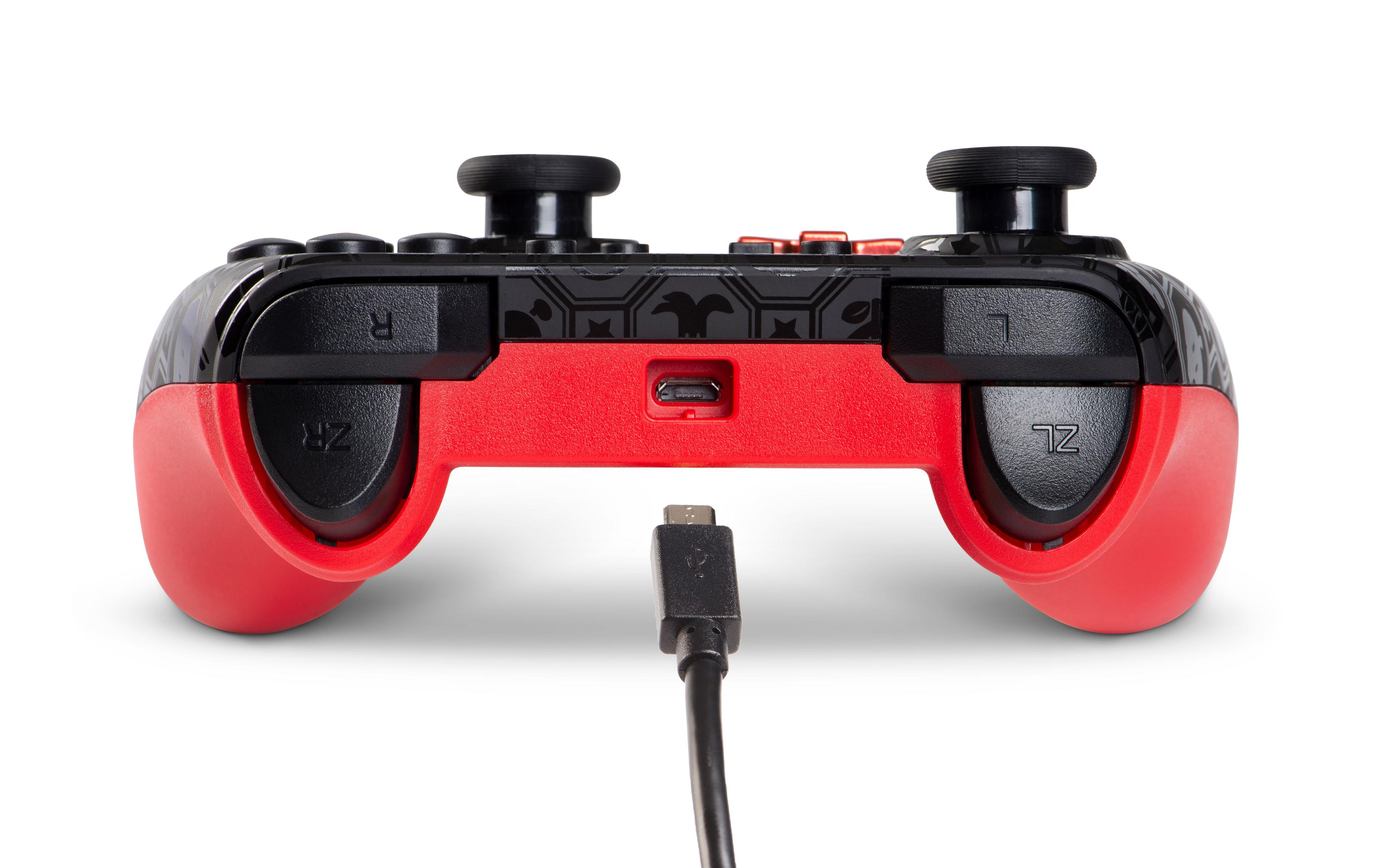 Rote und schwarze Controller-Unterseite mit USB-Kabelanschluss.