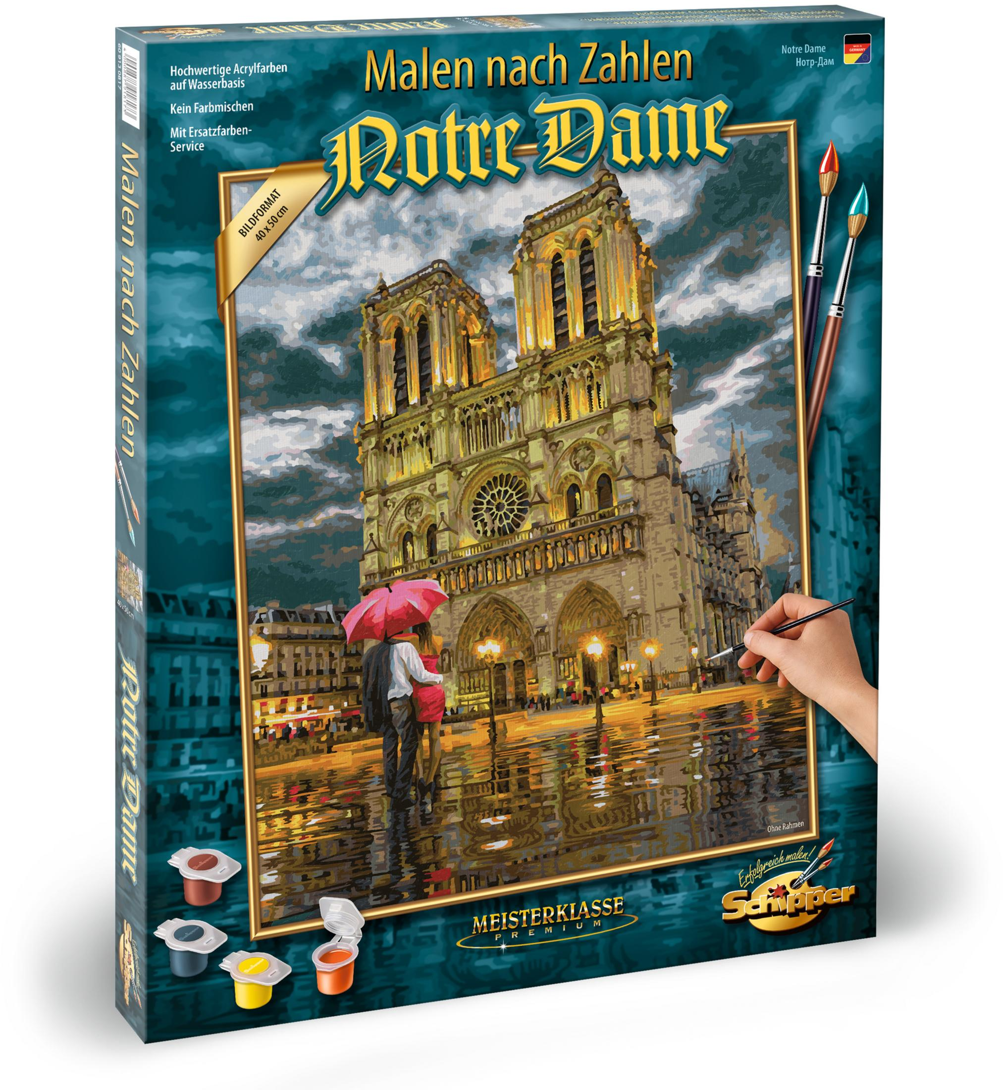 Verpackung für ein Malen-nach-Zahlen-Set mit Notre Dame, Pinsel und Farben.