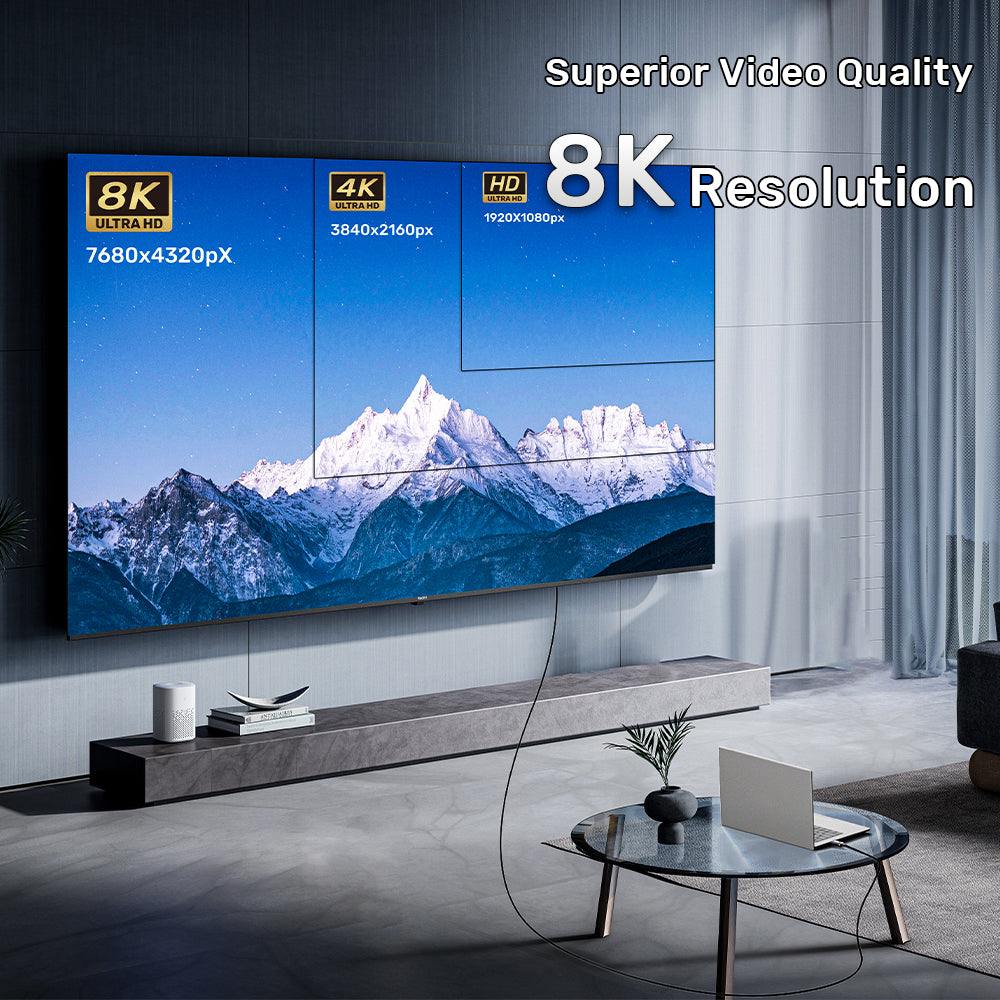 Une grande TV affiche une scène de montagne, comparant les résolutions 8K, 4K et HD.