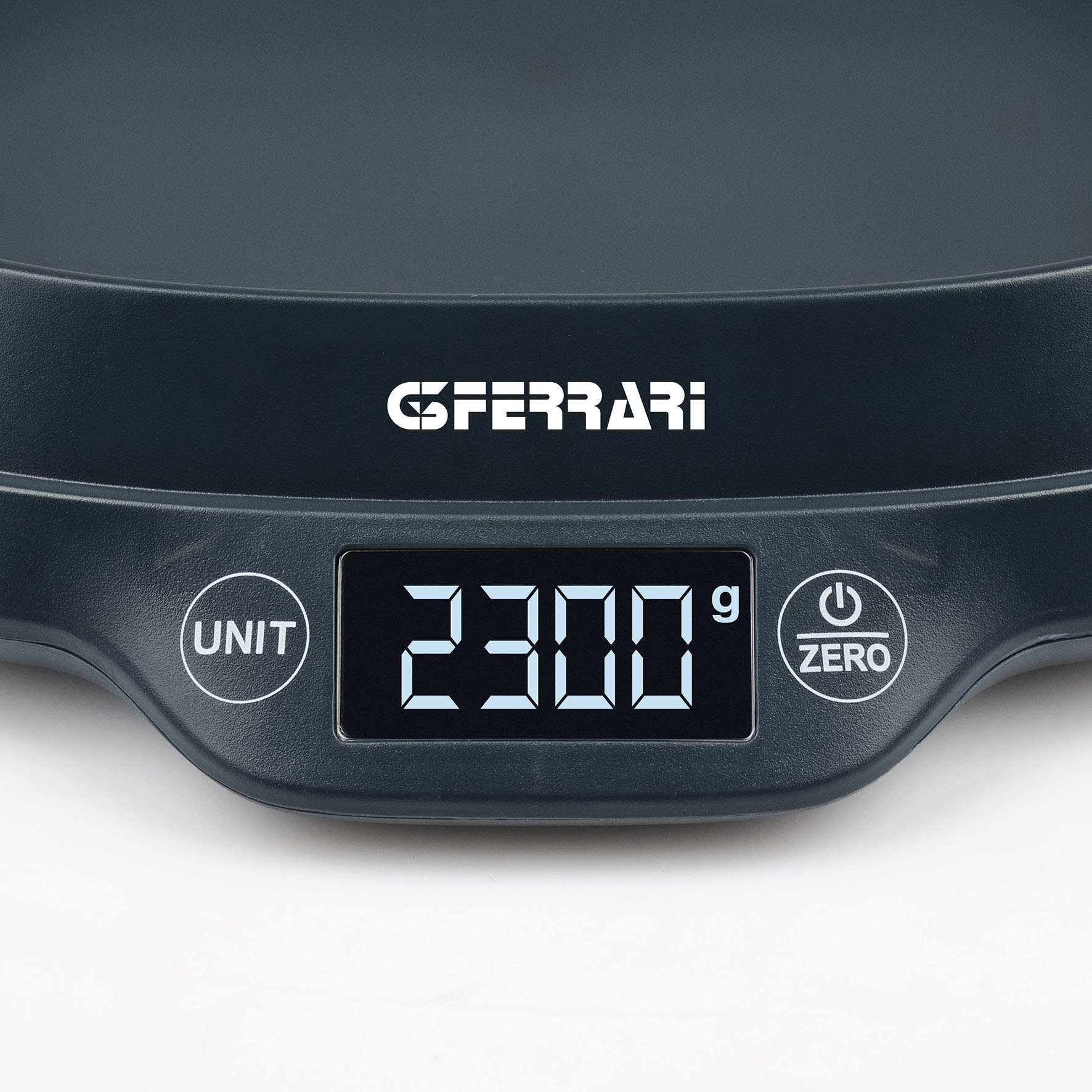 Dunkle digitale Küchenwaage mit "2300 g" Anzeige, "Unit" und "Zero" Tasten.