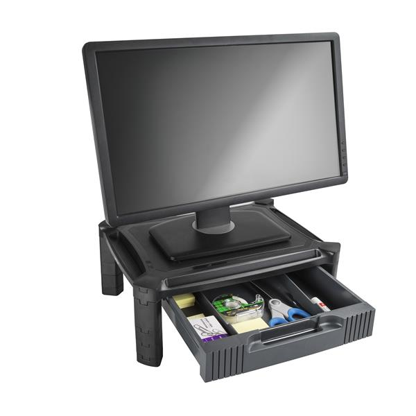 Un moniteur noir sur un organisateur de bureau avec tiroir. Fournitures de bureau visibles.
