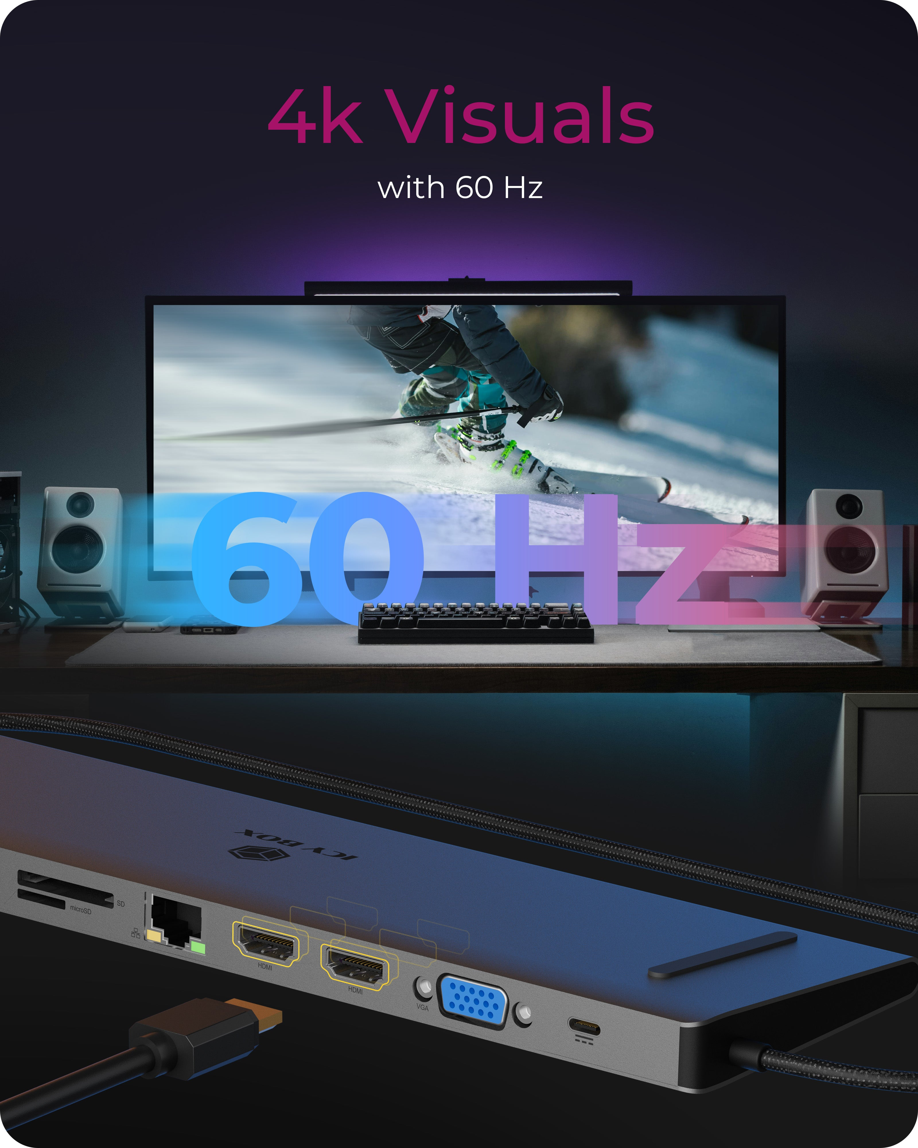 4k-Auflösung mit 60Hz. Ein Skifahrer auf einem Monitor, Lautsprecher, Tastatur und Dockingstation.