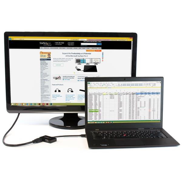 Un monitor y un portátil conectados. El monitor muestra una web, el portátil una hoja de cálculo.