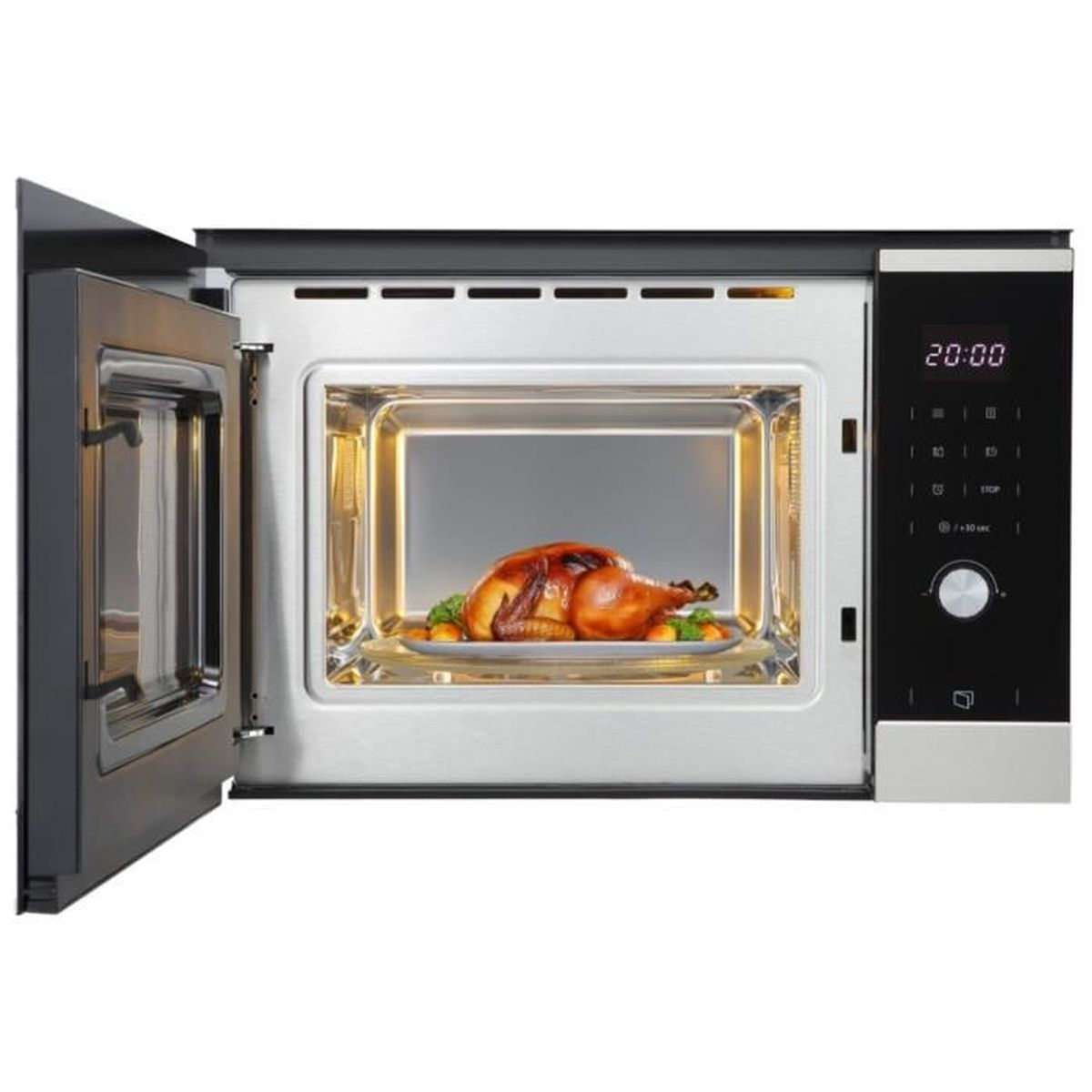 Un tacchino dorato con guarnizione all'interno di un forno a microonde illuminato.