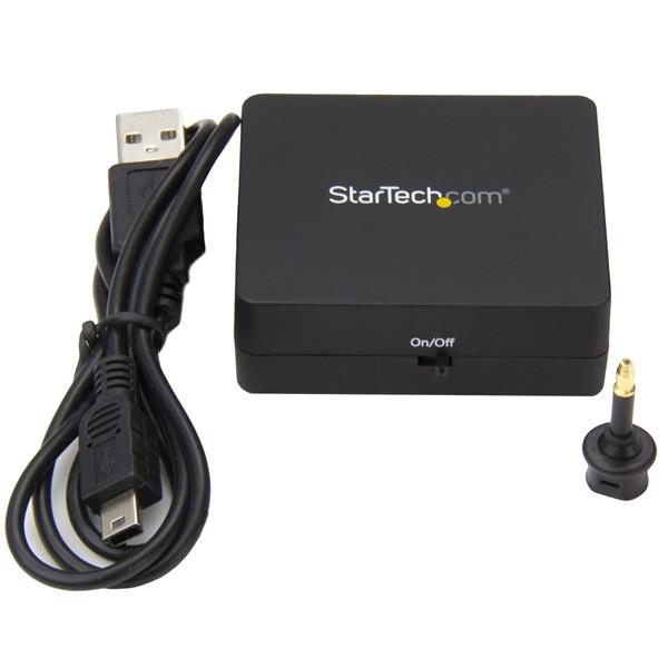 Dispositivo negro con cable USB, interruptor de encendido/apagado y adaptador óptico.