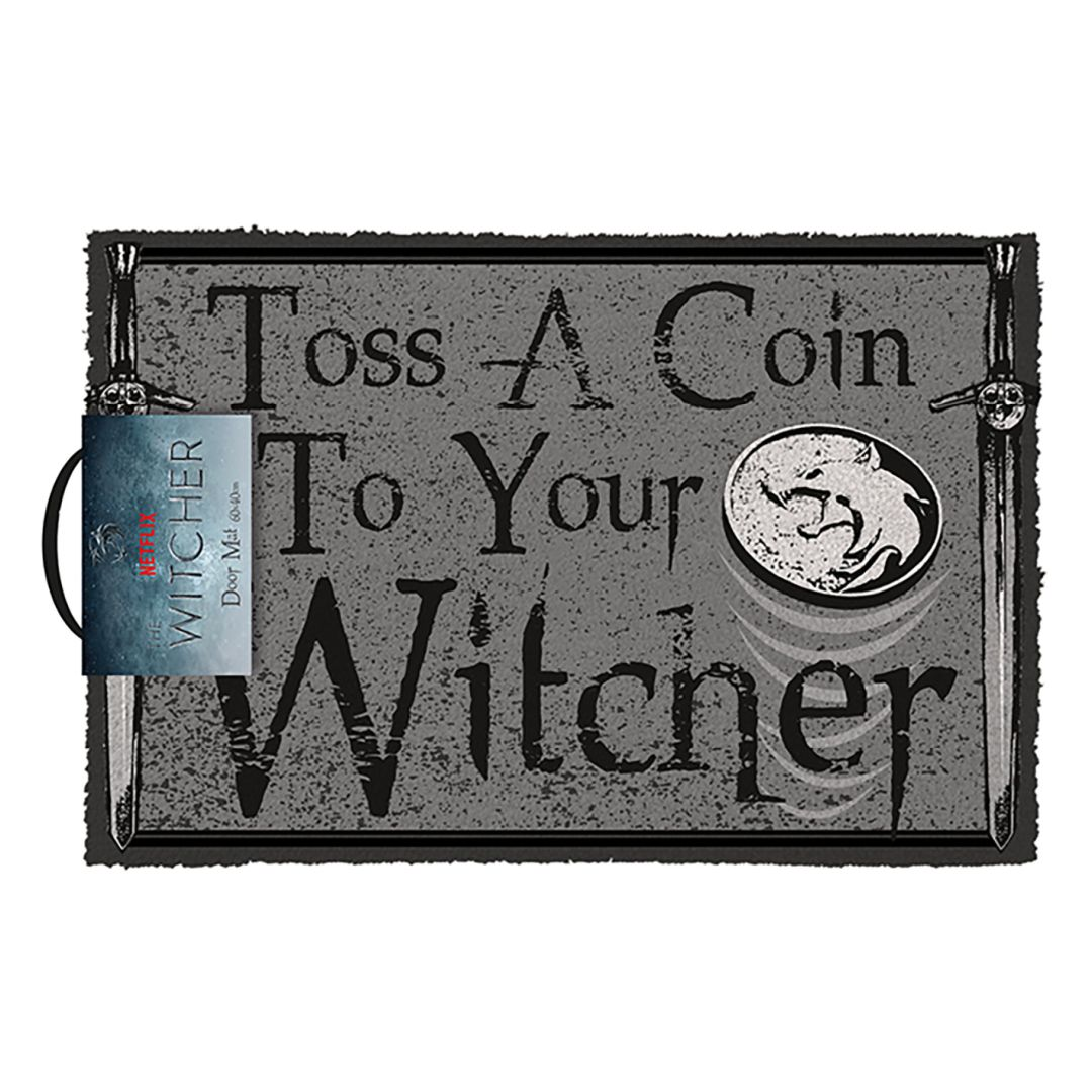 Wytrzieraczka tematyczna Wiedźmina z mieczami i grafiką monety. Tekst: Toss A Coin To Your Witcher.