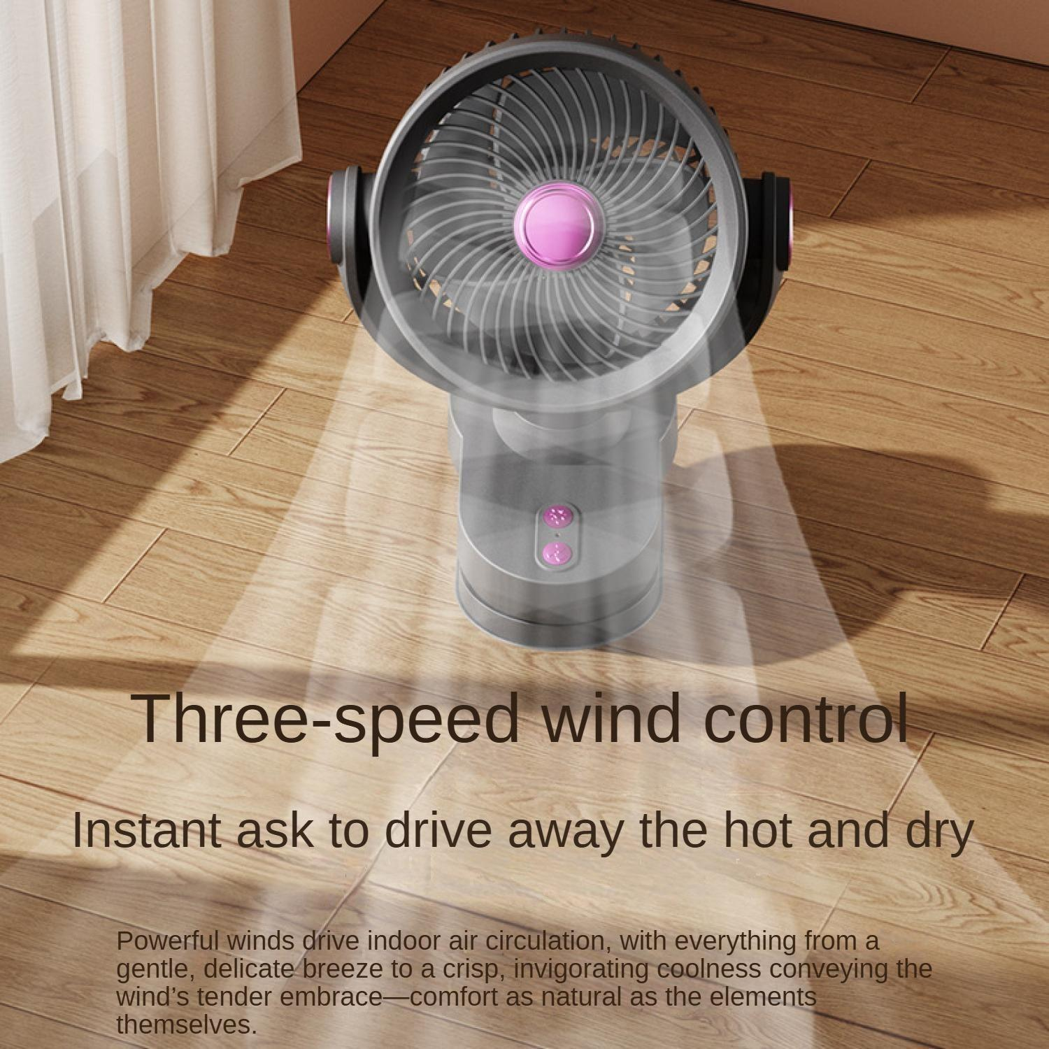 Ein grauer Ventilator mit pinkem Akzent auf einem Holzboden.