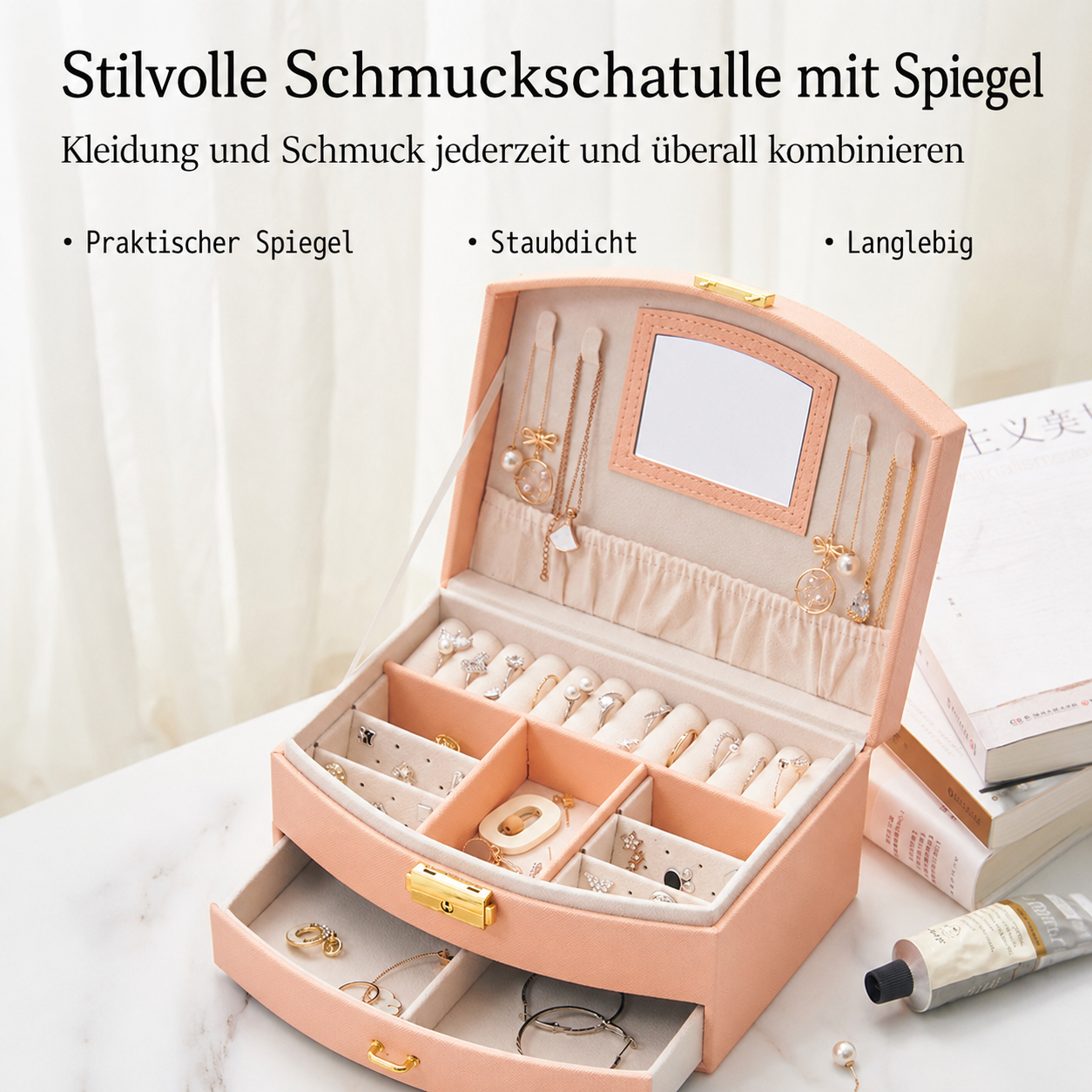 Eine offene, rosafarbene Schmuckschatulle mit mehreren Fächern und Schmuck.