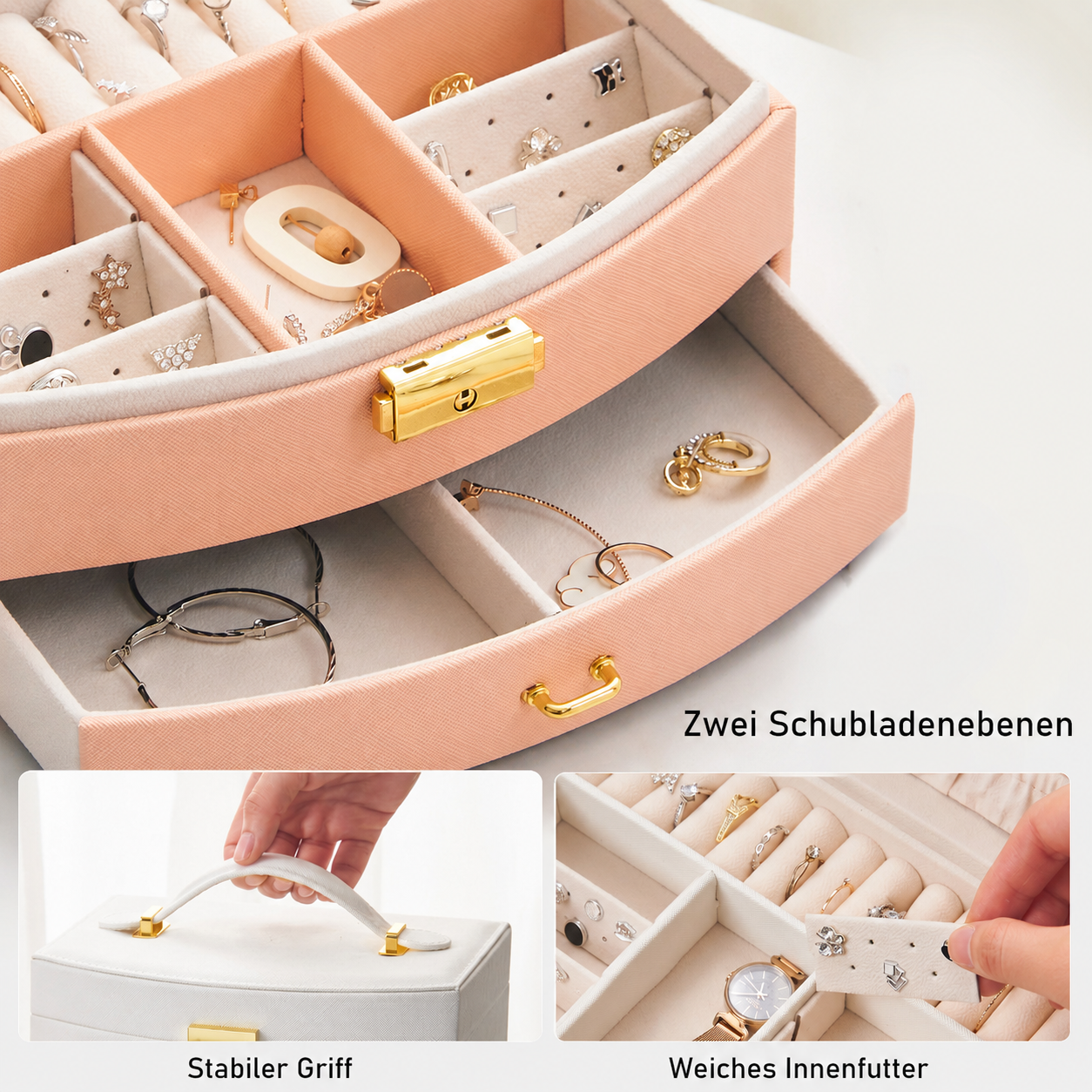 Rosa Schmuckkasten mit zwei Schubladen, gefüllt mit Schmuck, goldener Griff.