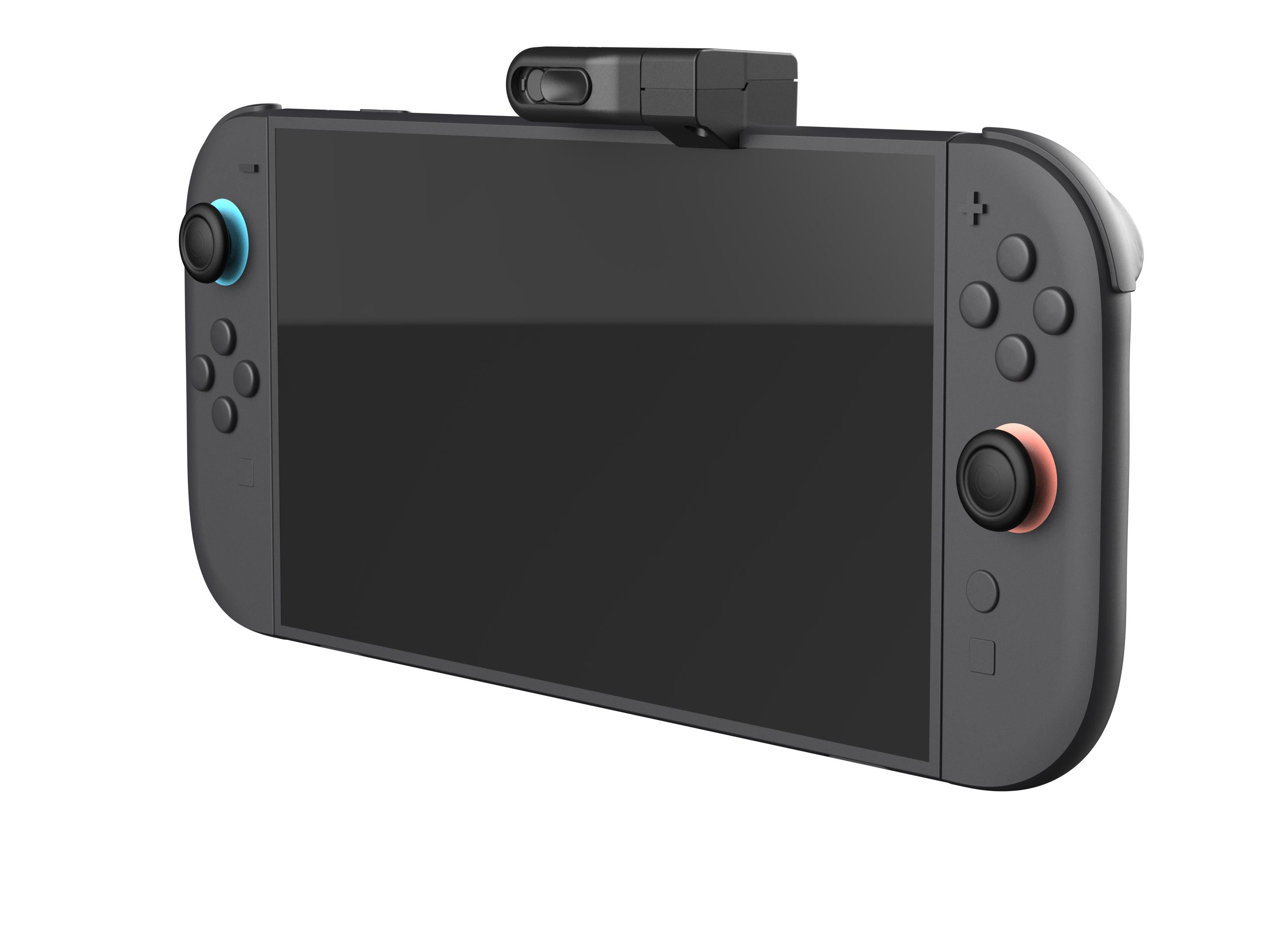 Un dispositivo di gioco portatile grigio con schermo scuro e pulsanti.