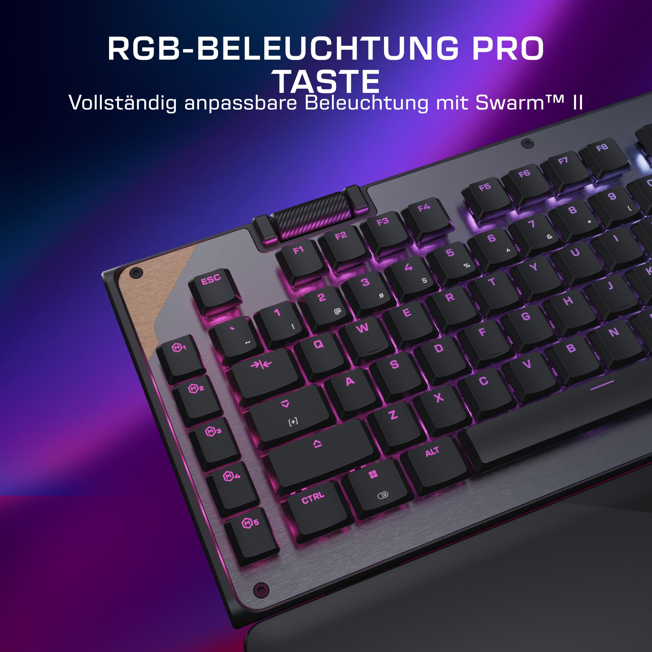 Eine Nahaufnahme einer Tastatur mit pinker RGB-Beleuchtung und metallischem Finish.