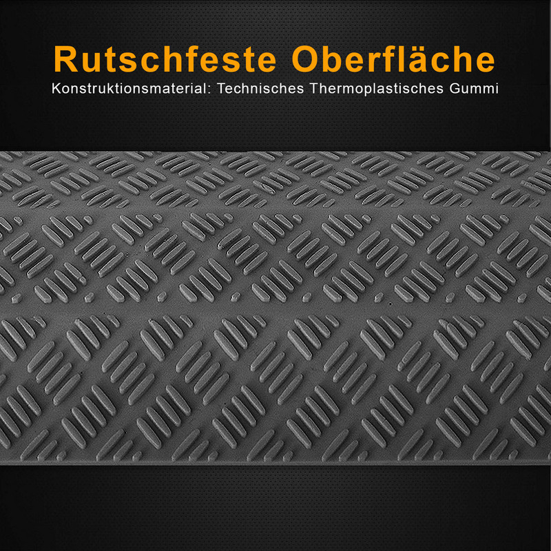 Graue rutschfeste Oberfläche mit Rautenmuster aus Gummi.