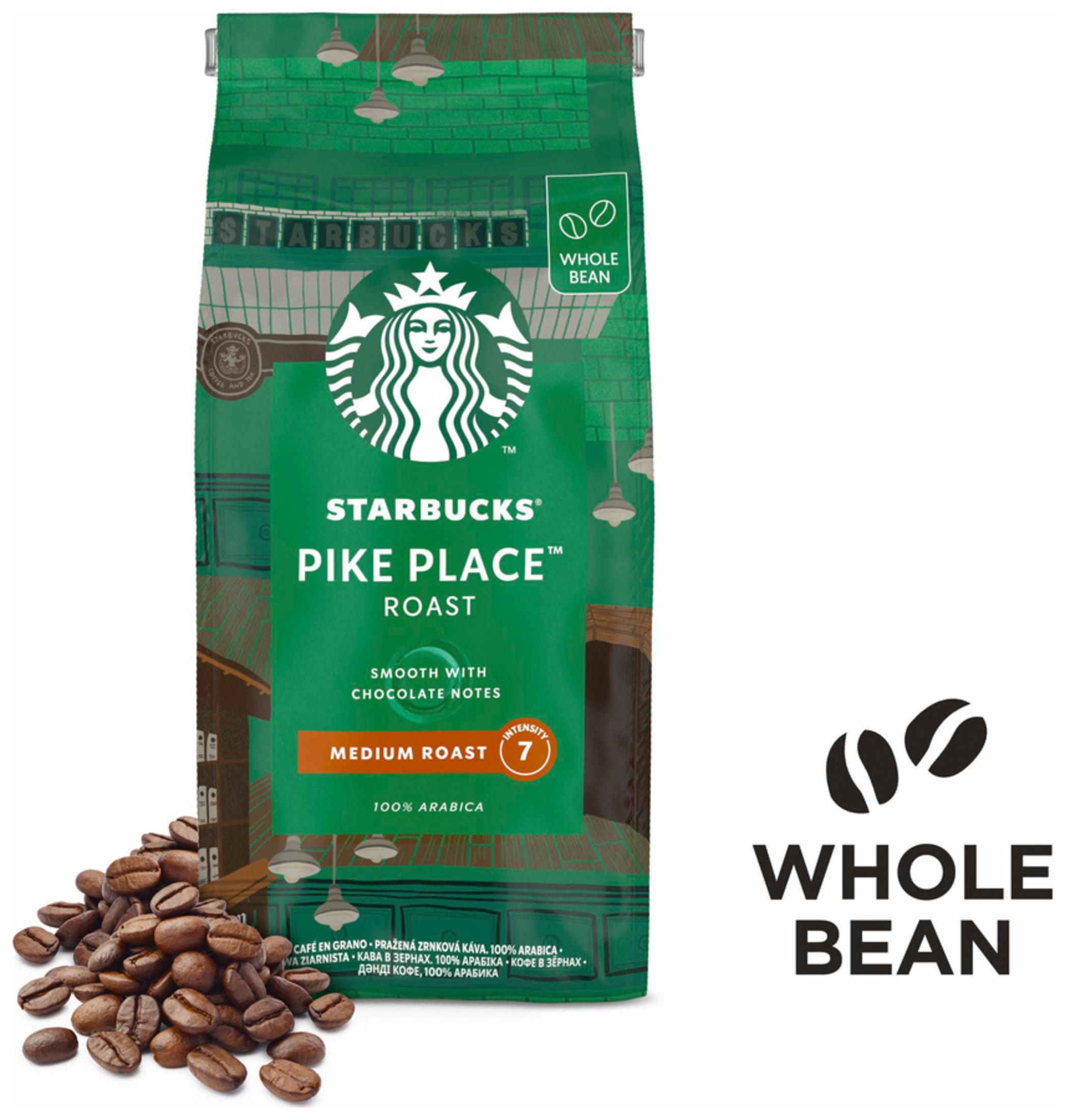 Una borsa verde di caffè Starbucks Pike Place Roast con chicchi di caffè.