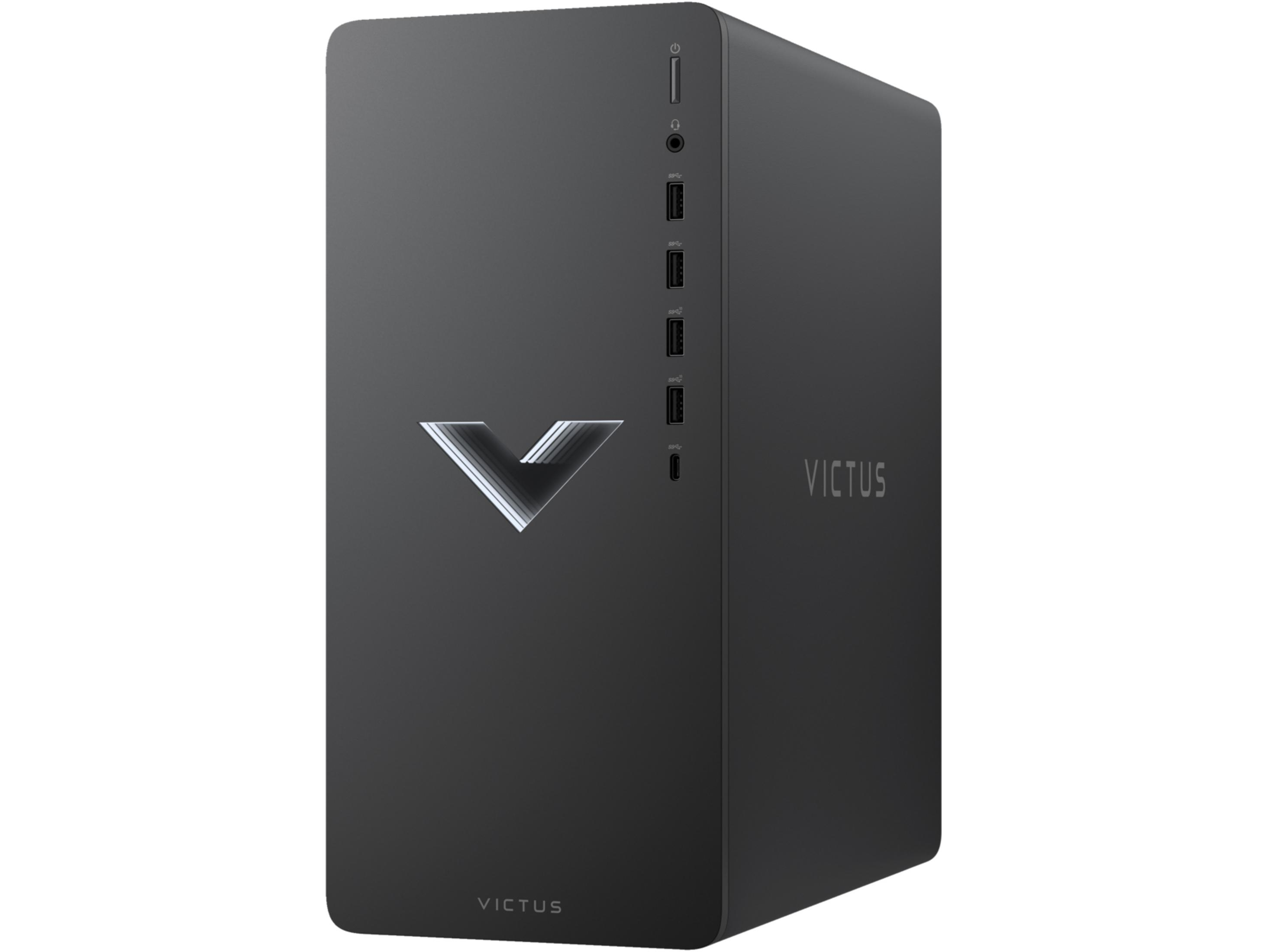 Una PC de escritorio negra con logo plateado en V y puertos frontales.