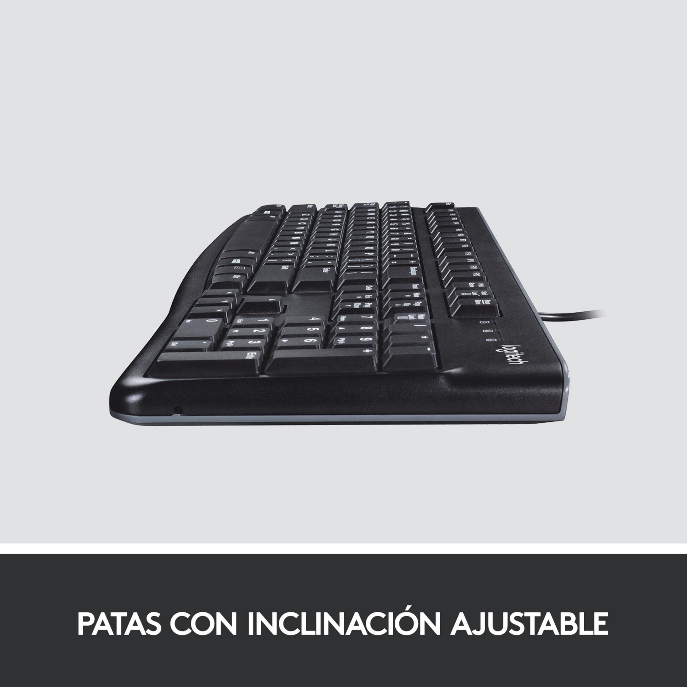 Black Logitech keyboard with a slightly raised design and cable on a gray background.