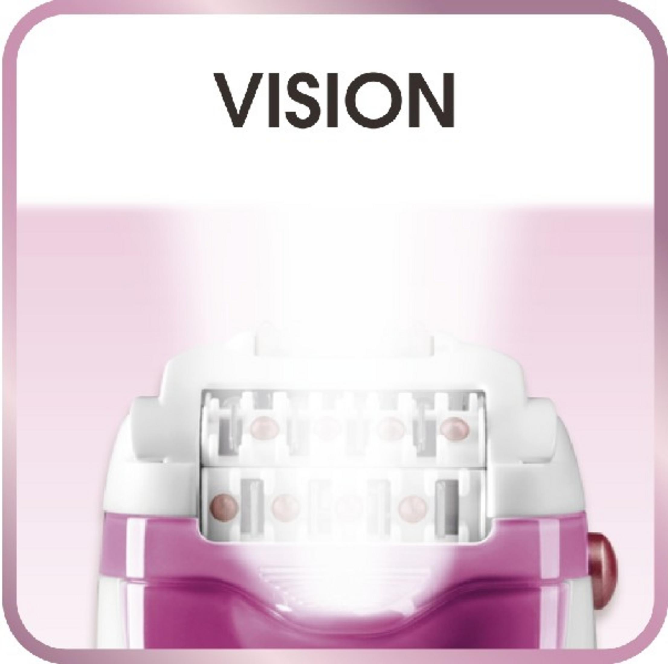Primer plano de una depiladora con la palabra VISION. Partes blancas y moradas.