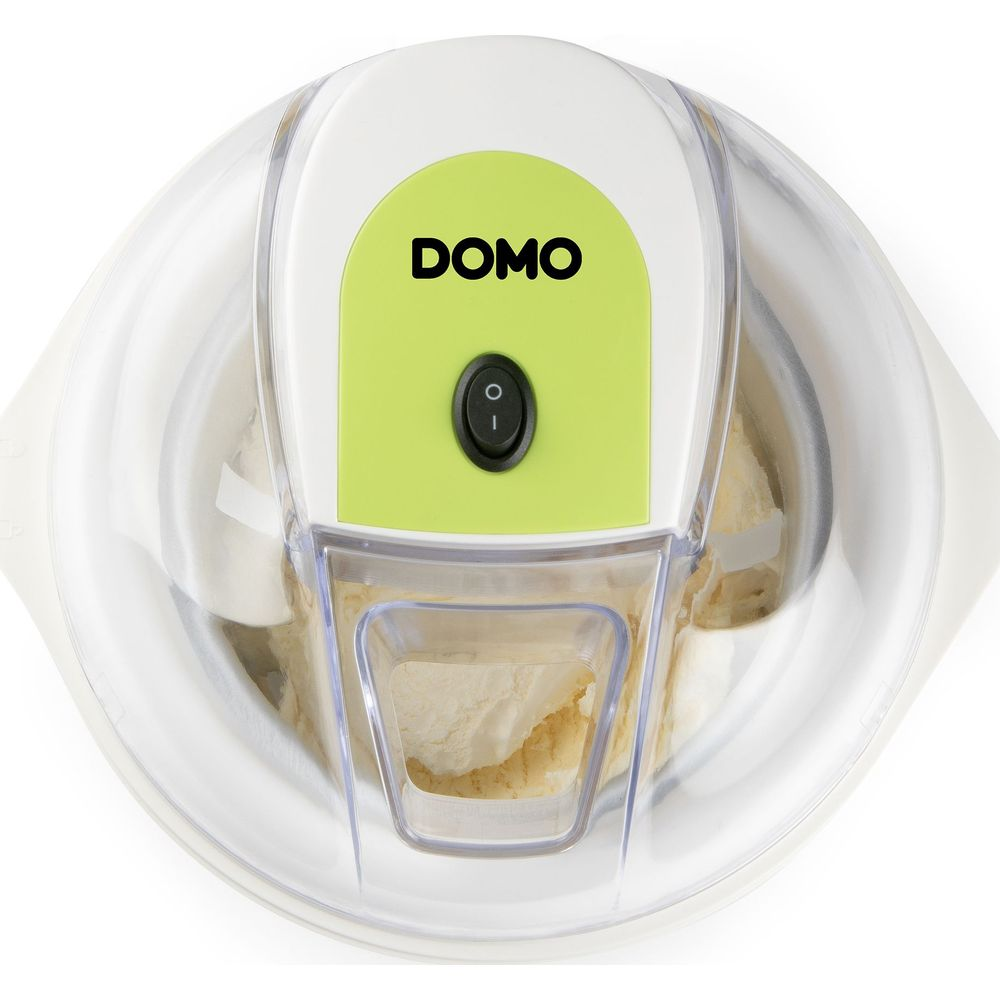 Domo Eismaschine mit grünem Schalter und Eis im Behälter.