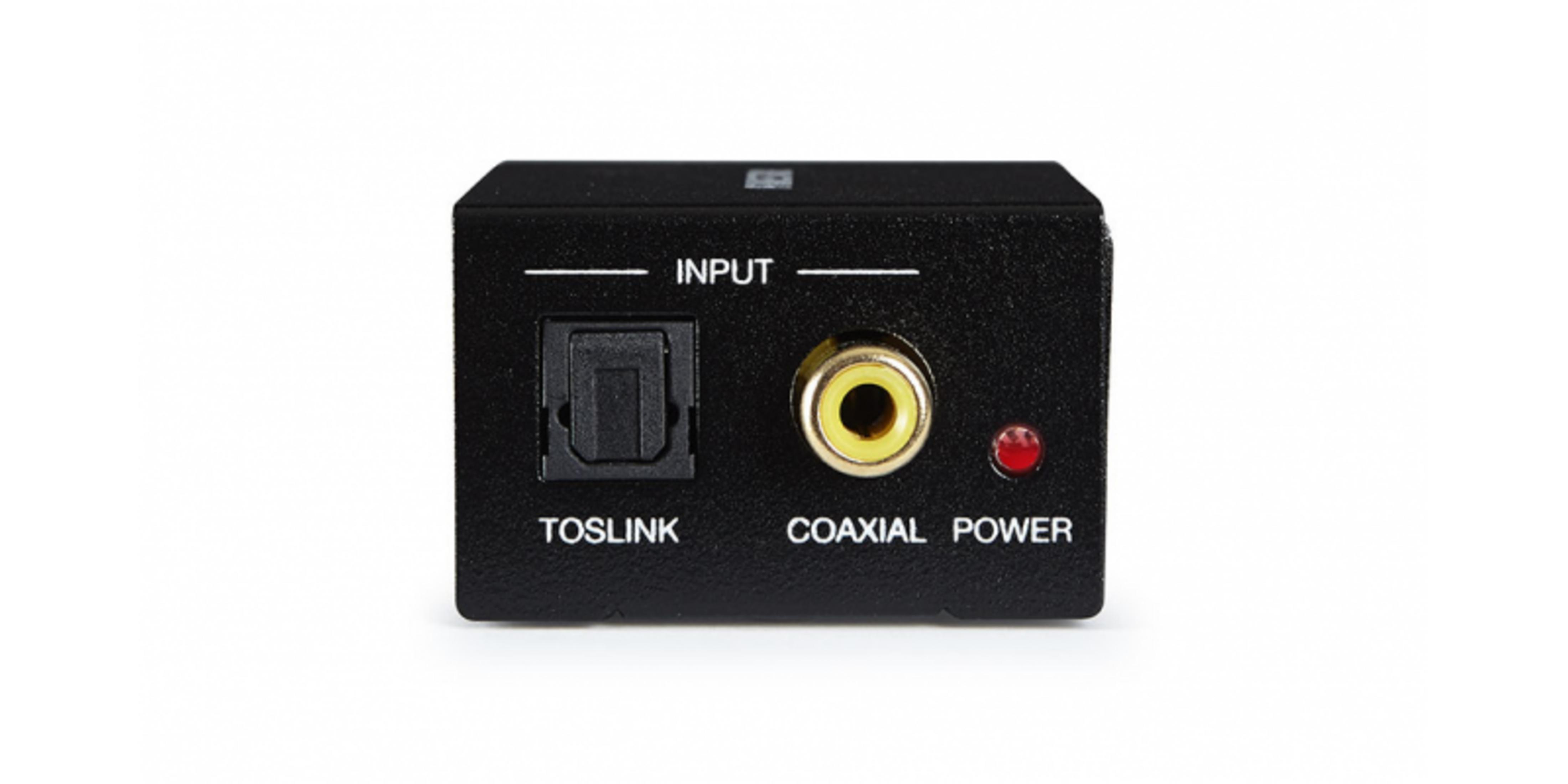 Ein schwarzer Konverter mit Toslink-, Koaxial- und Stromanschlüssen.