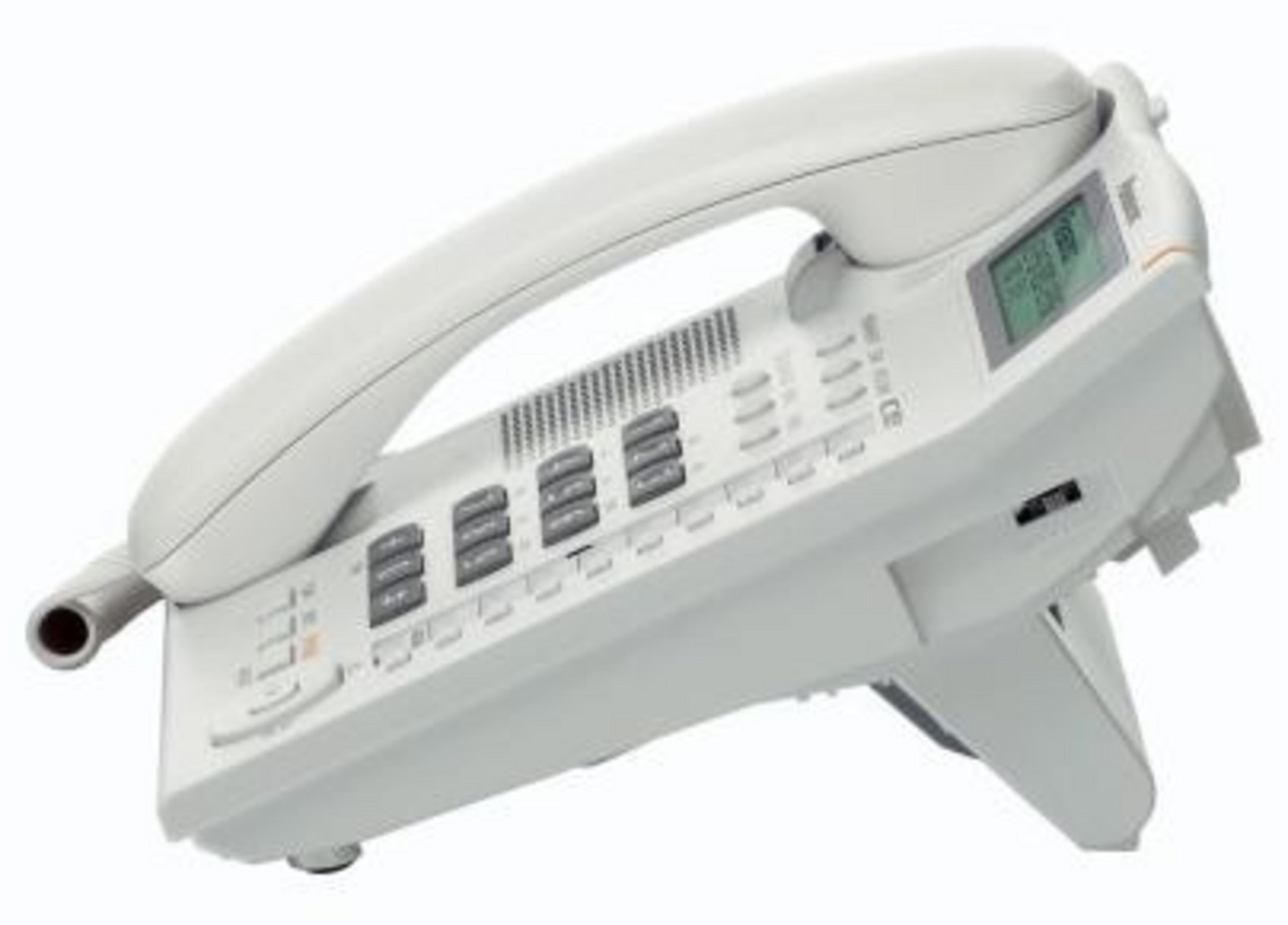 Un téléphone filaire blanc avec écran et de nombreux boutons.