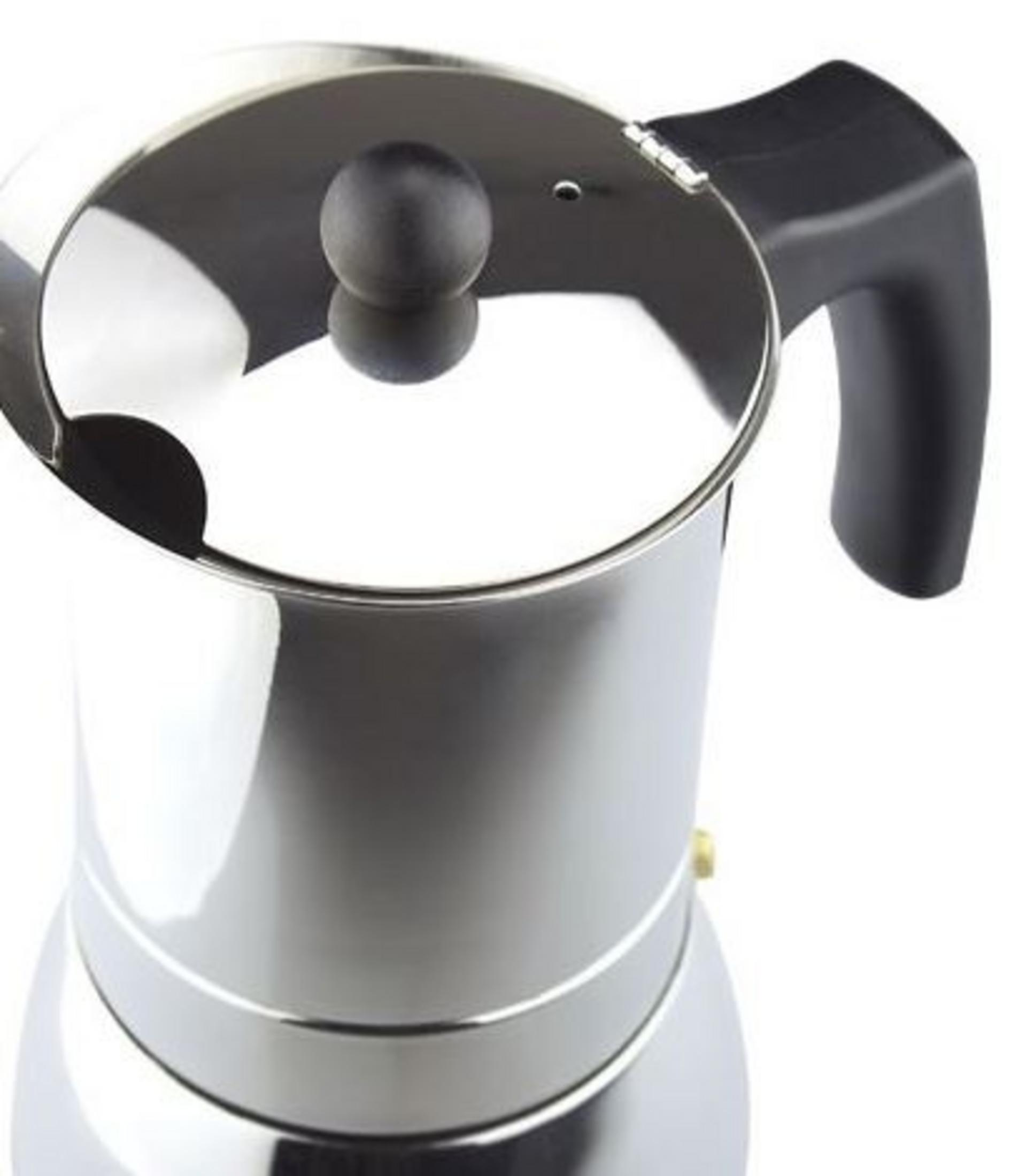 Una cafetera espresso plateada con mango y pomo negros.