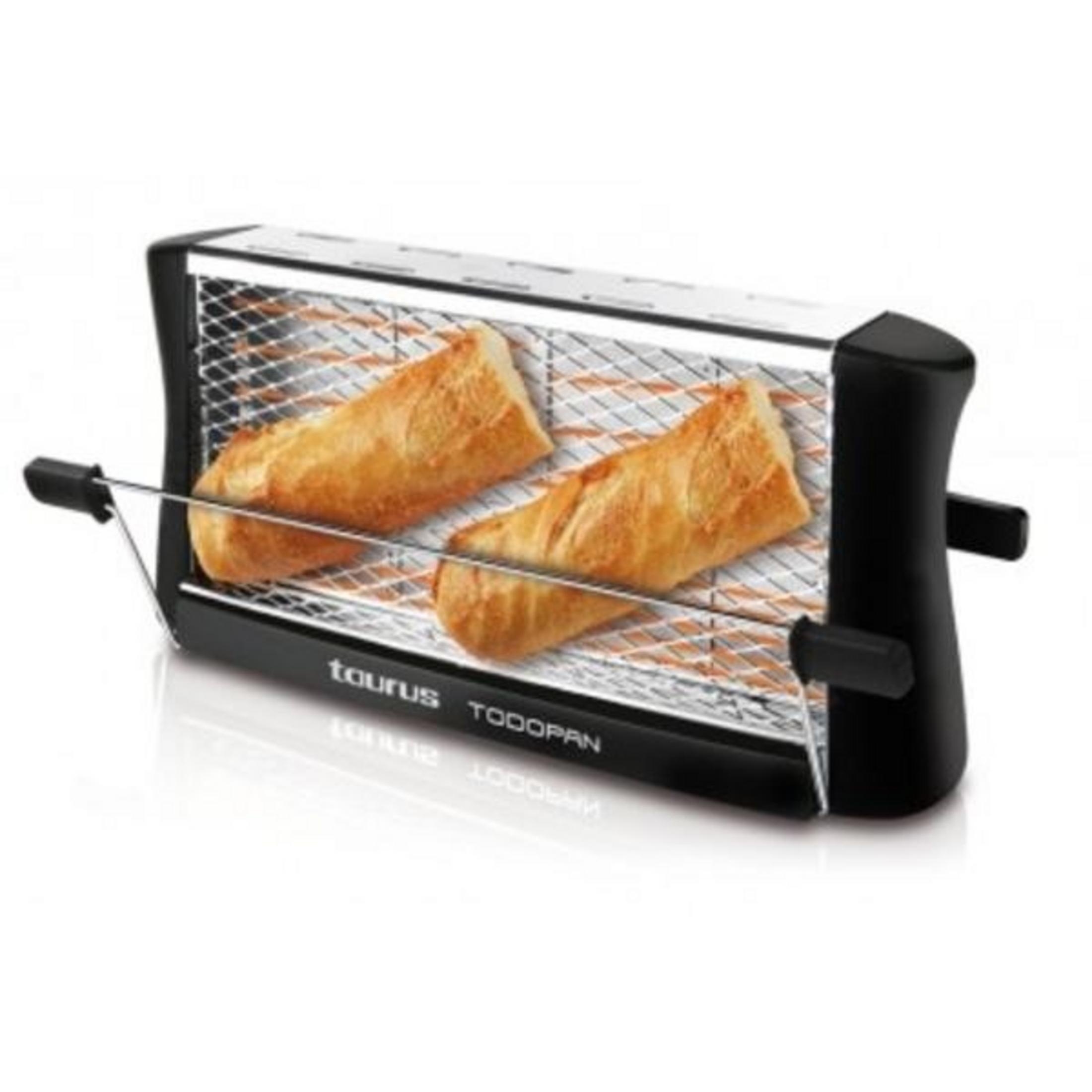 Ein schwarzer Toaster mit zwei goldenen Baguettes im Inneren.