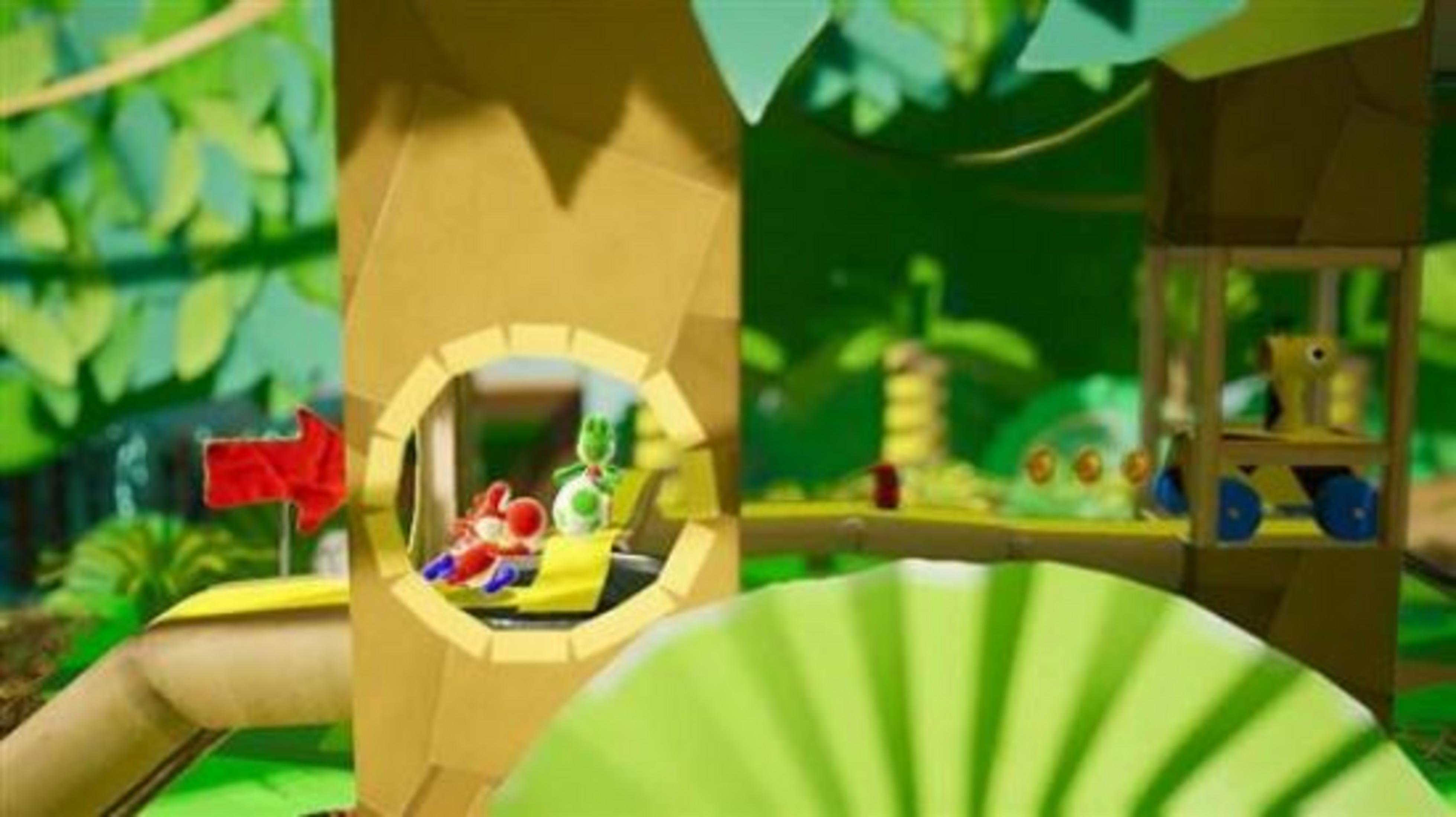 Yoshis rojos y verdes en un túnel de cartón, con personaje amarillo en vehículo.