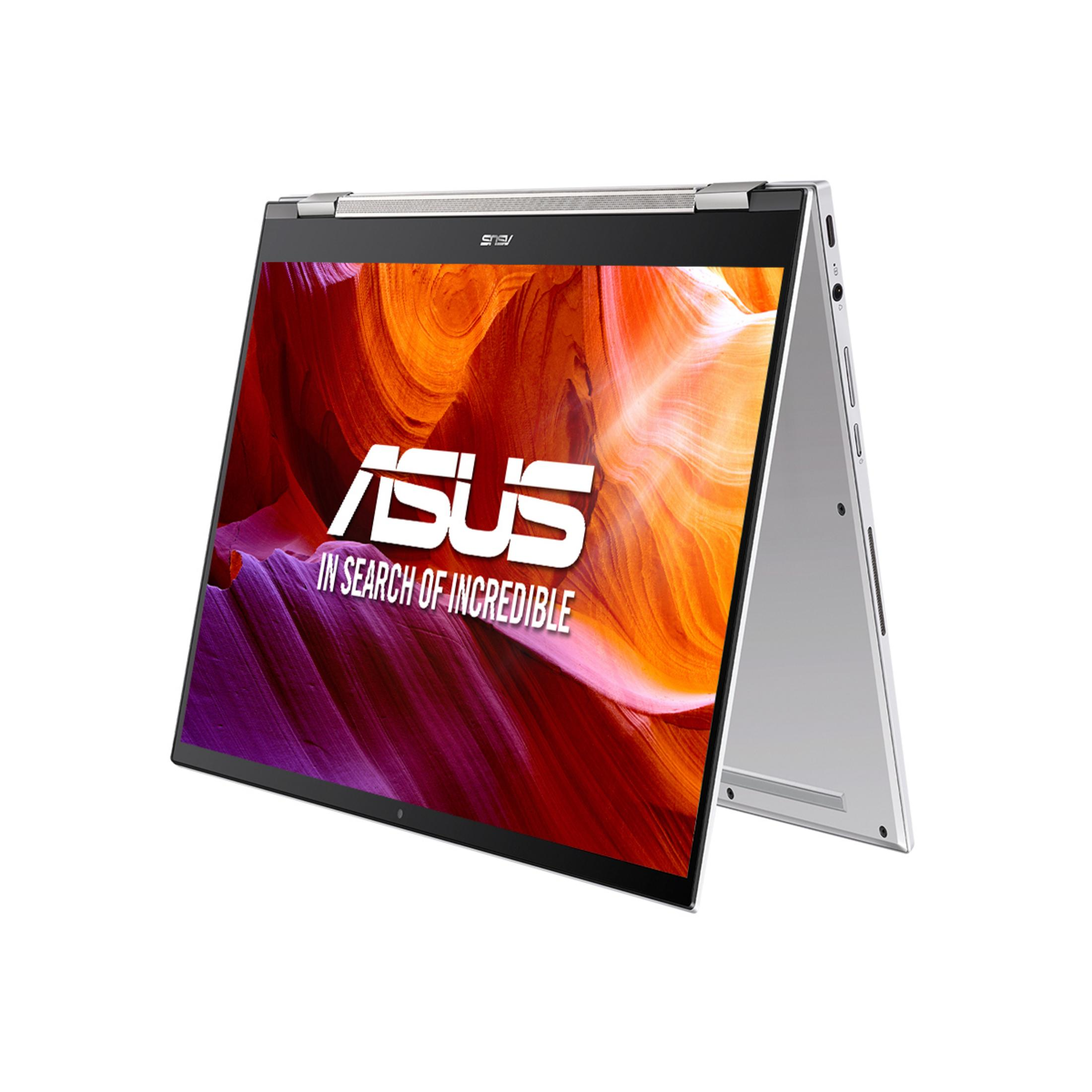 Un portátil Asus plateado con un fondo colorido en la pantalla.